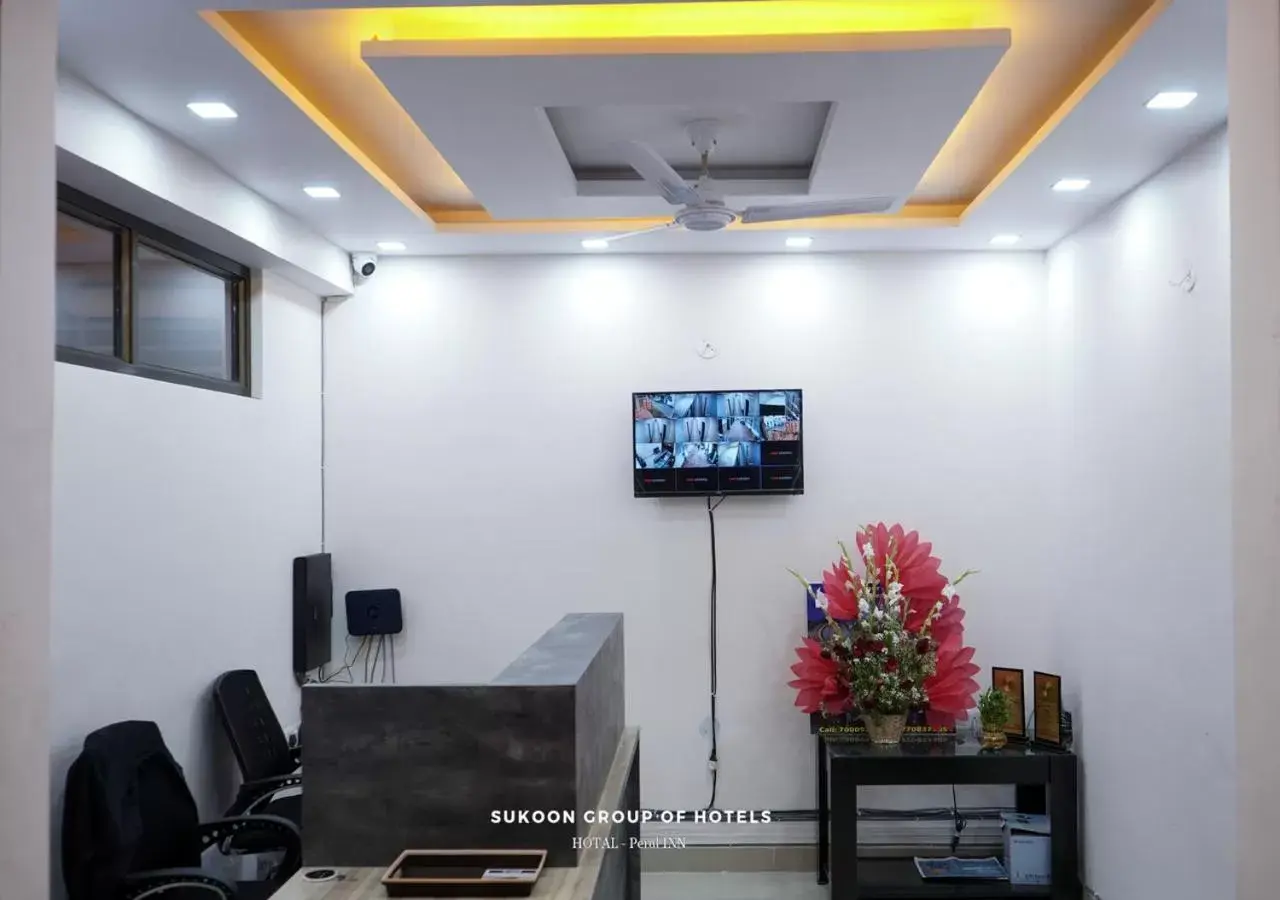 Lobby or reception, TV/Entertainment Center in Sukoon Pearl inn Lobby or reception, TV/Entertainment Center in Sukoon Pearl inn