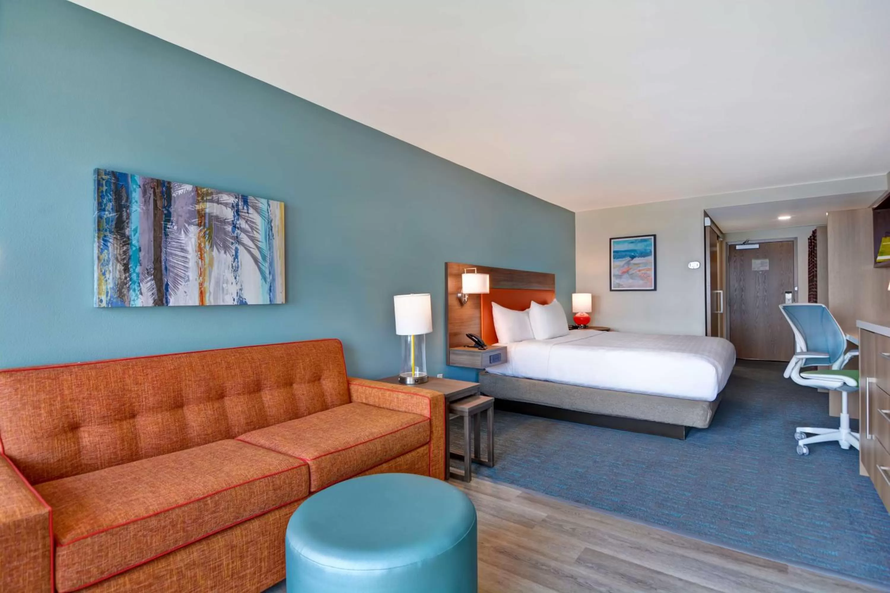 Living room, Bed in Home2 Suites Ormond Beach Oceanfront, FL