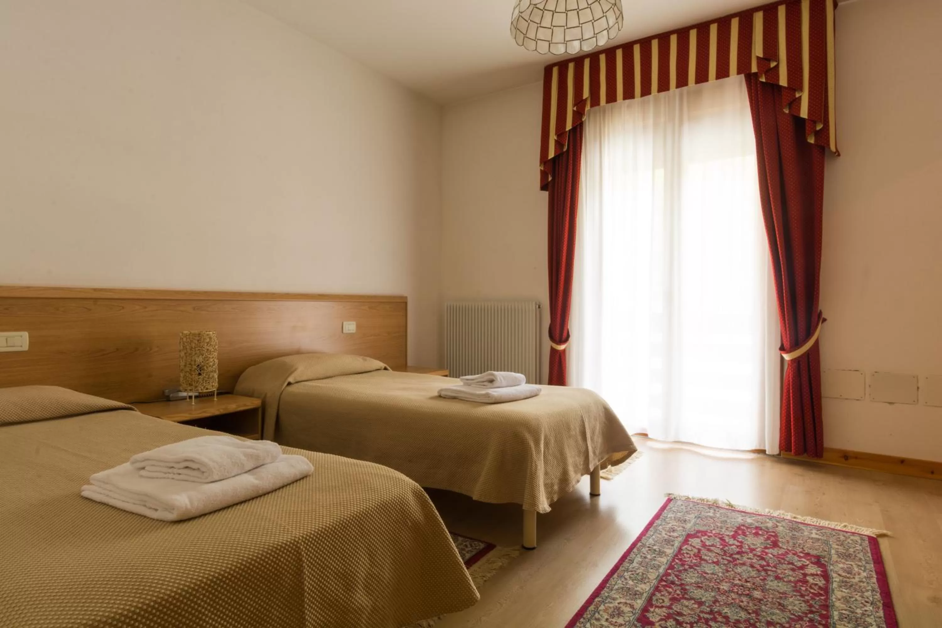 Bed in Albergo Dalla Mena