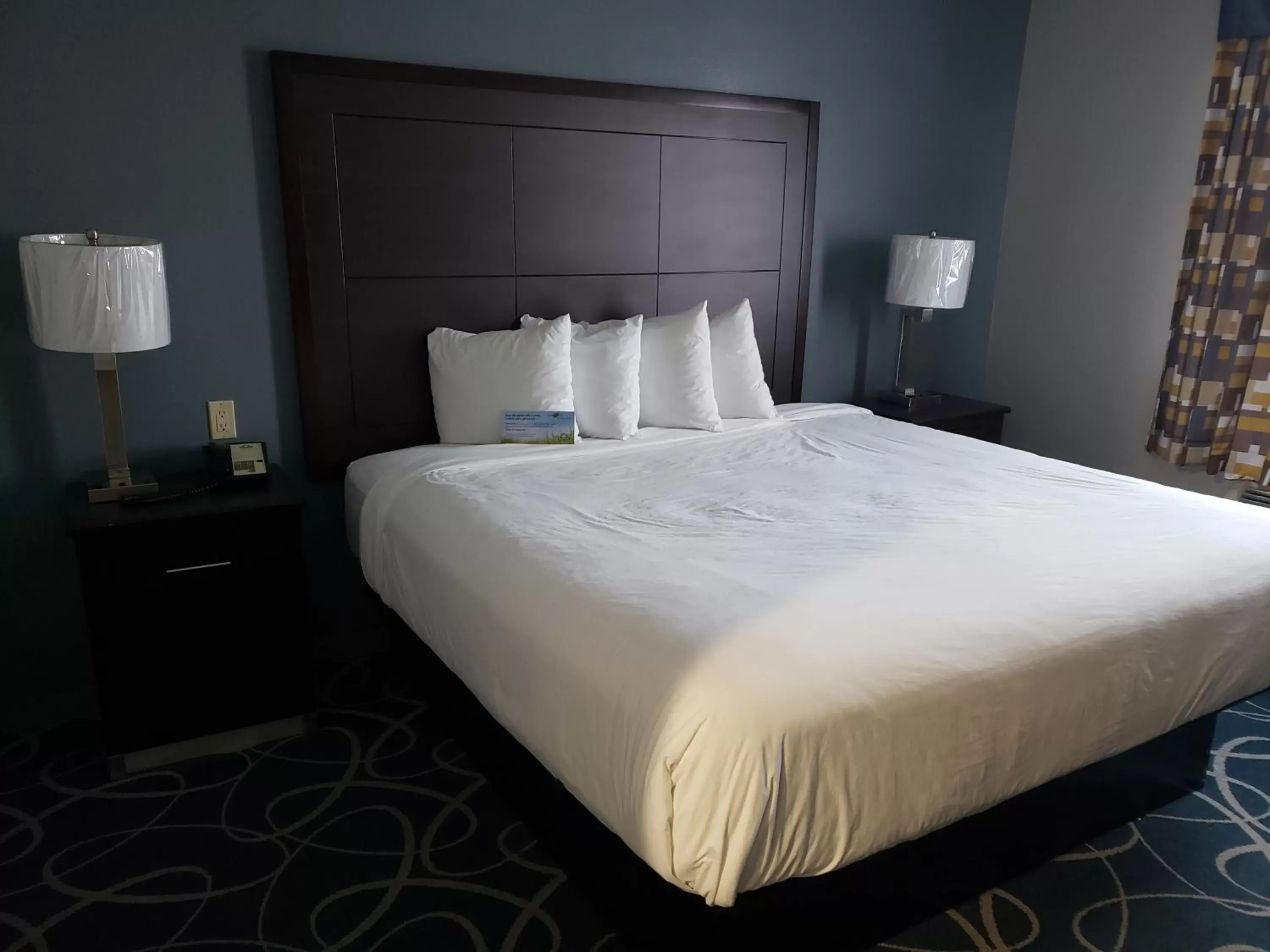 Bed in Days Inn & Suites by Wyndham Cleburne TX