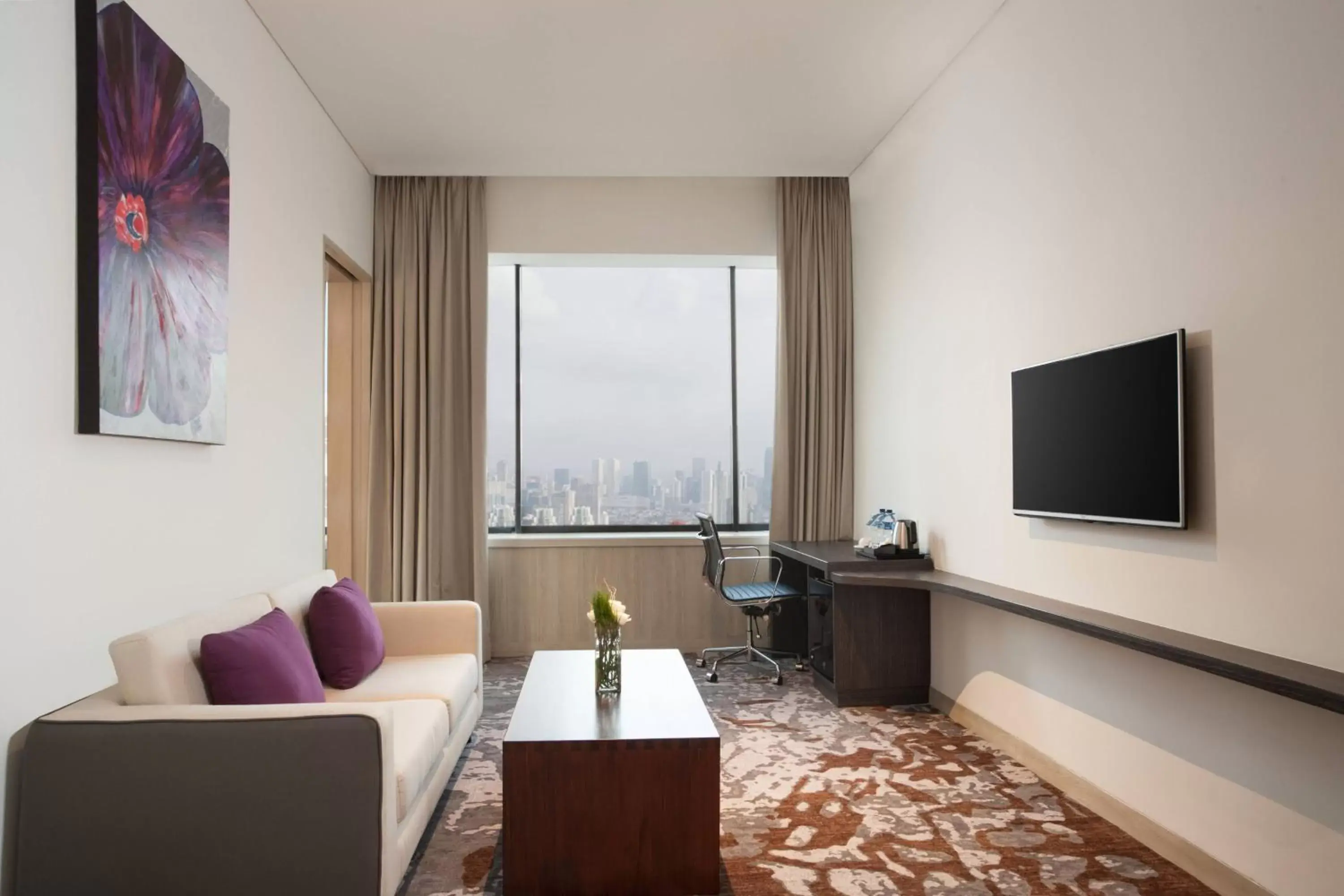 Living room, Seating Area in Four Points by Sheraton Jakarta Thamrin