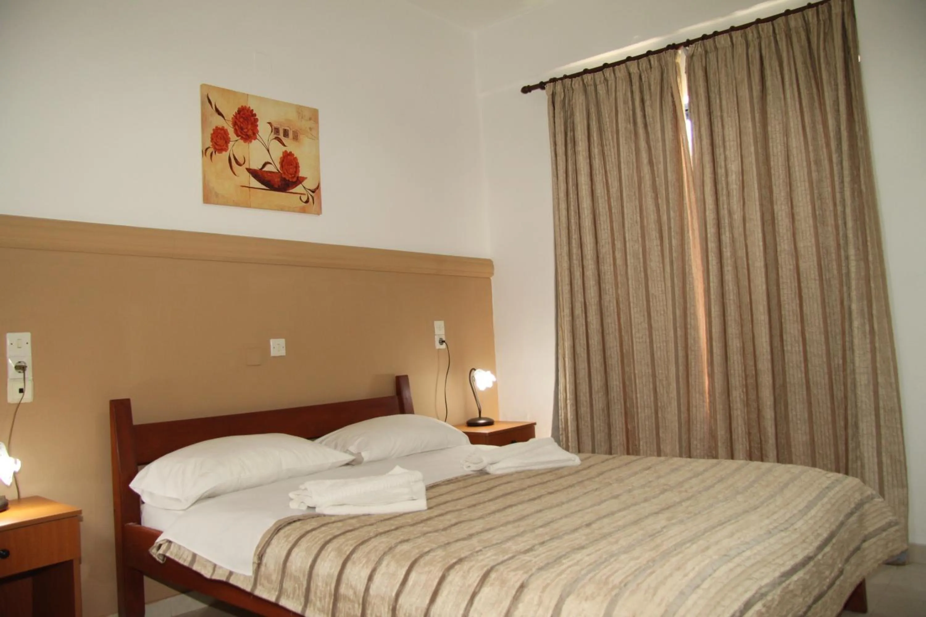 Bedroom, Bed in Danaos Hotel