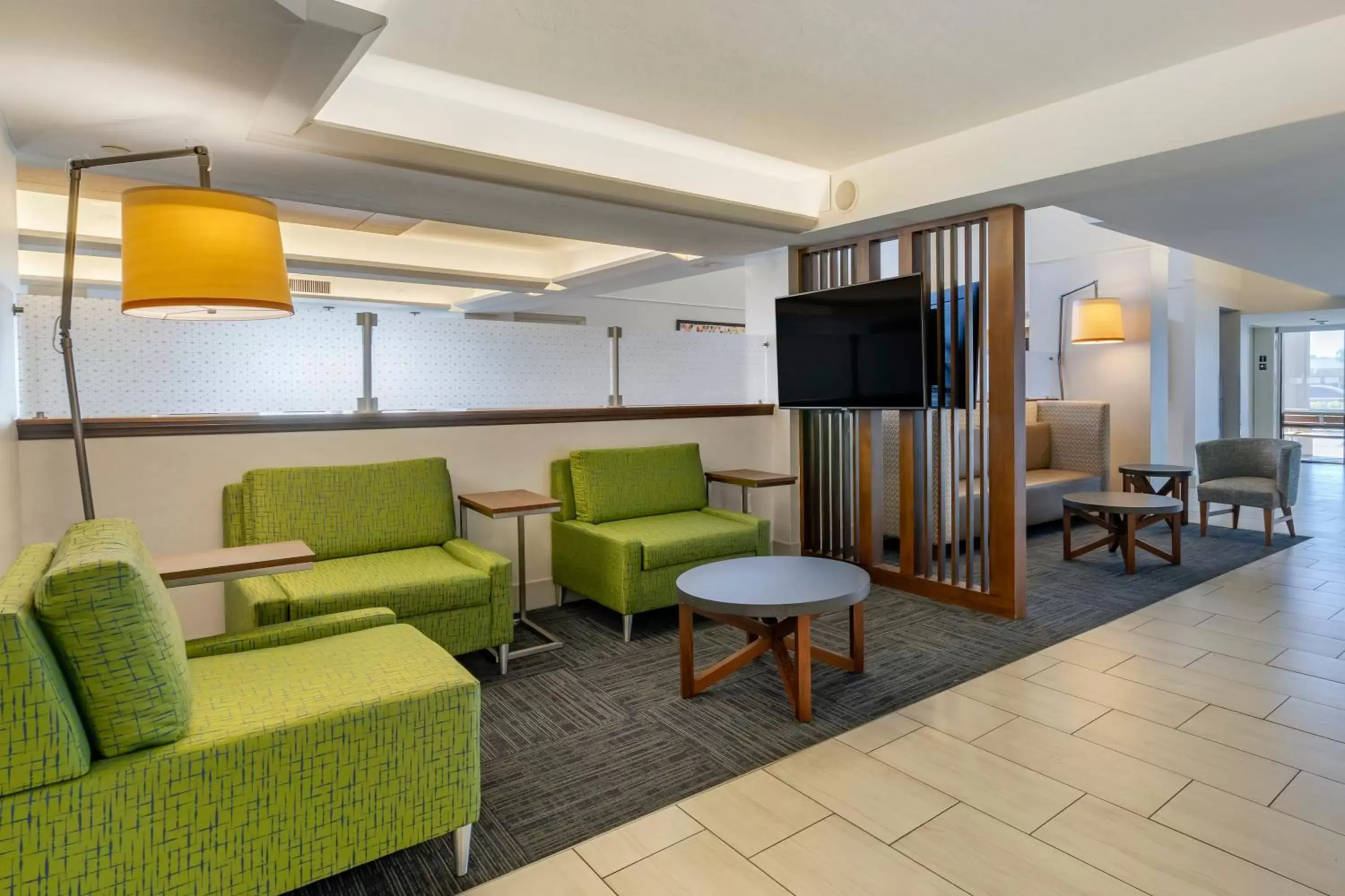 Property building, Seating Area in Holiday Inn Express Cape Coral-Fort Myers Area, an IHG Hotel