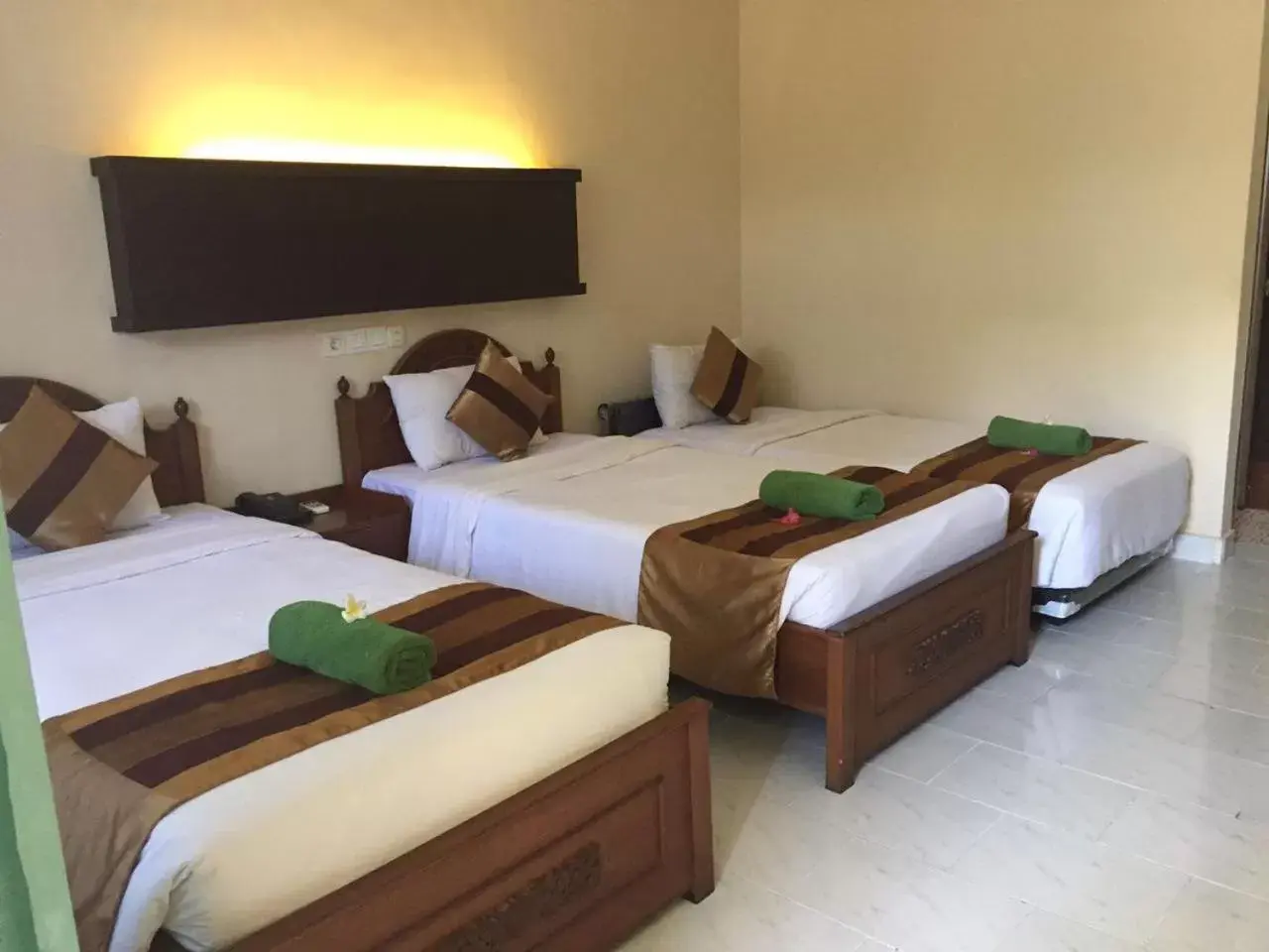 Bed in Bakung Beach Resort