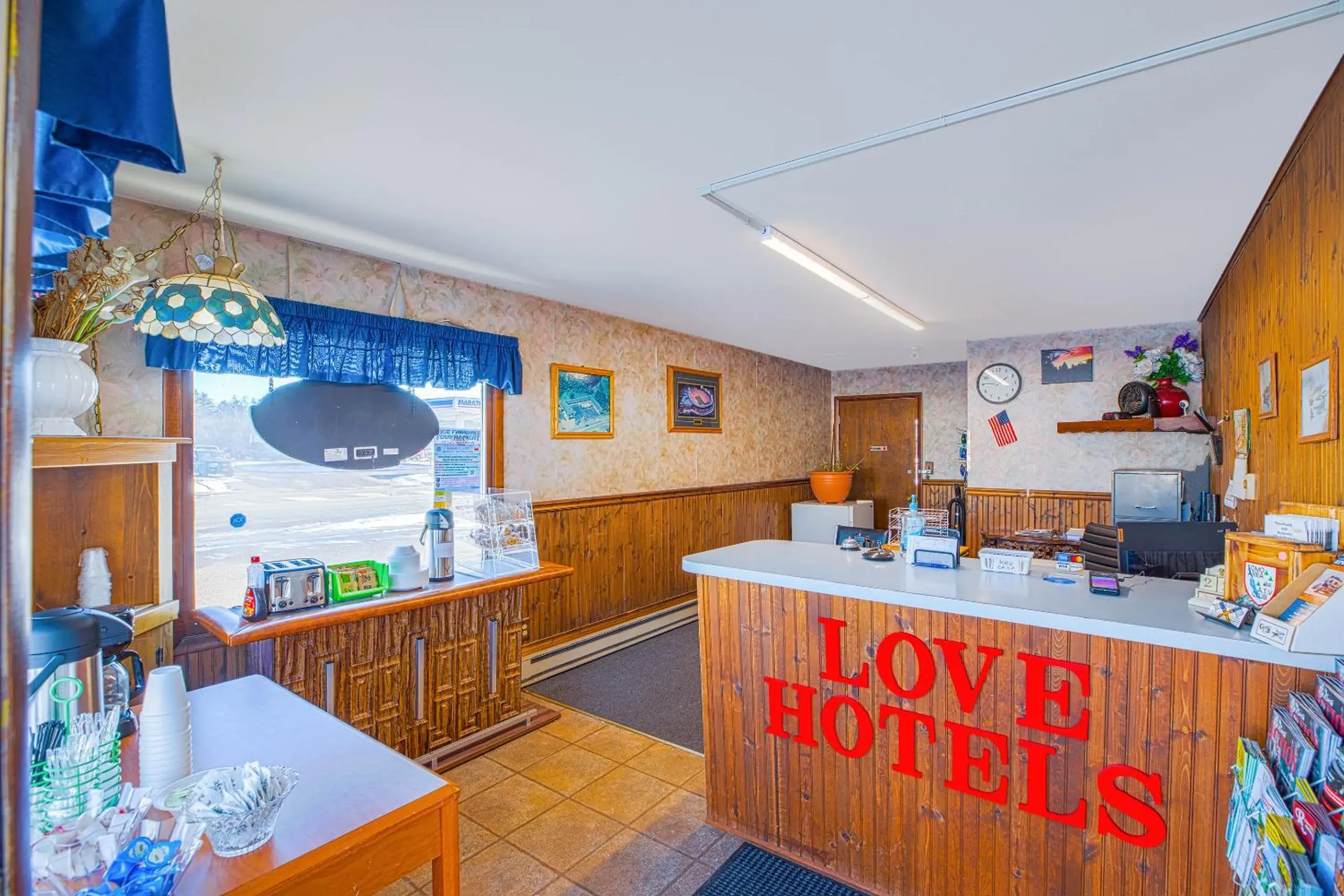 Lobby or reception in Love Hotels Tomahawk by OYO at Lake Mohawksin WI