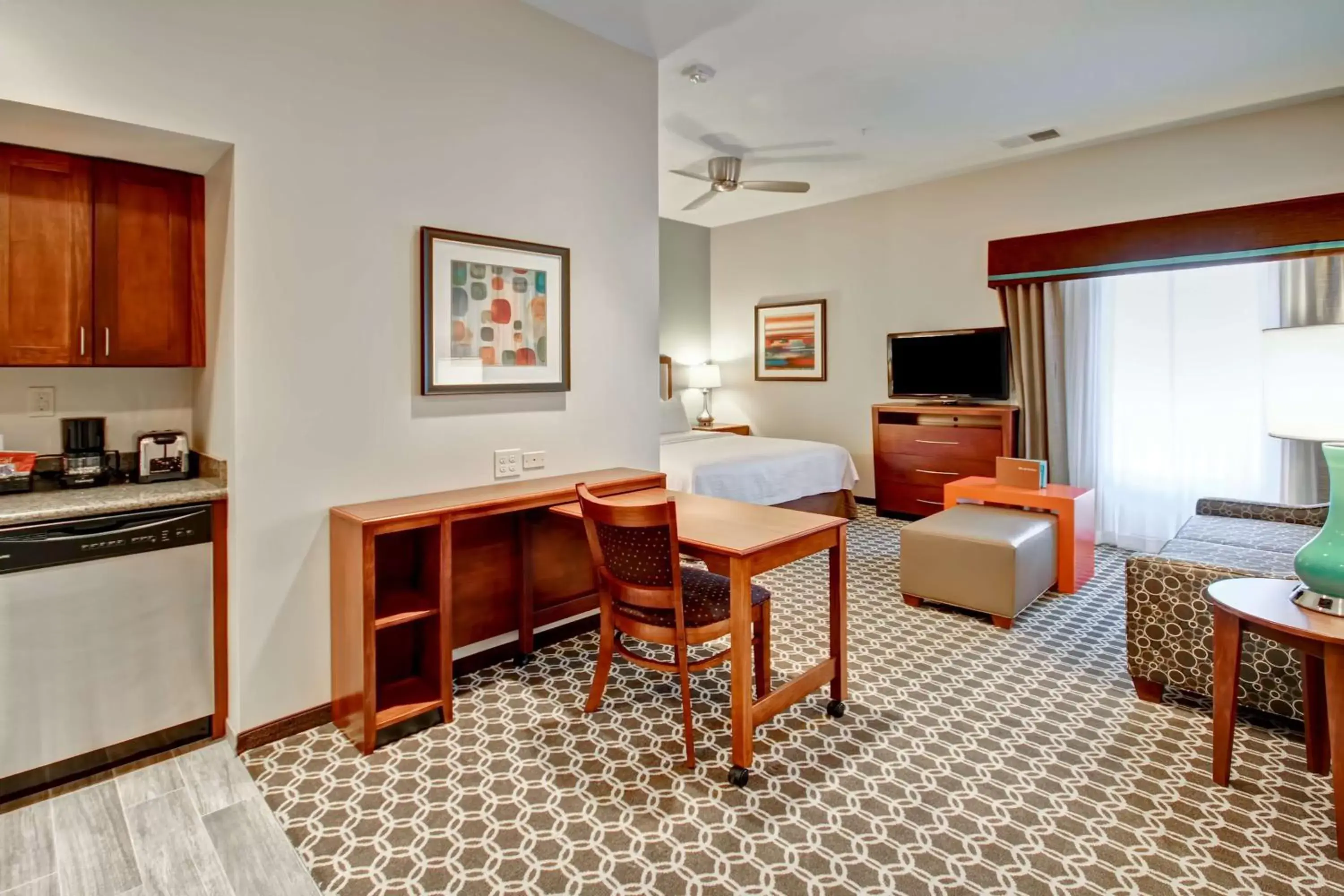 Bed, Seating Area in Homewood Suites by Hilton Greeley