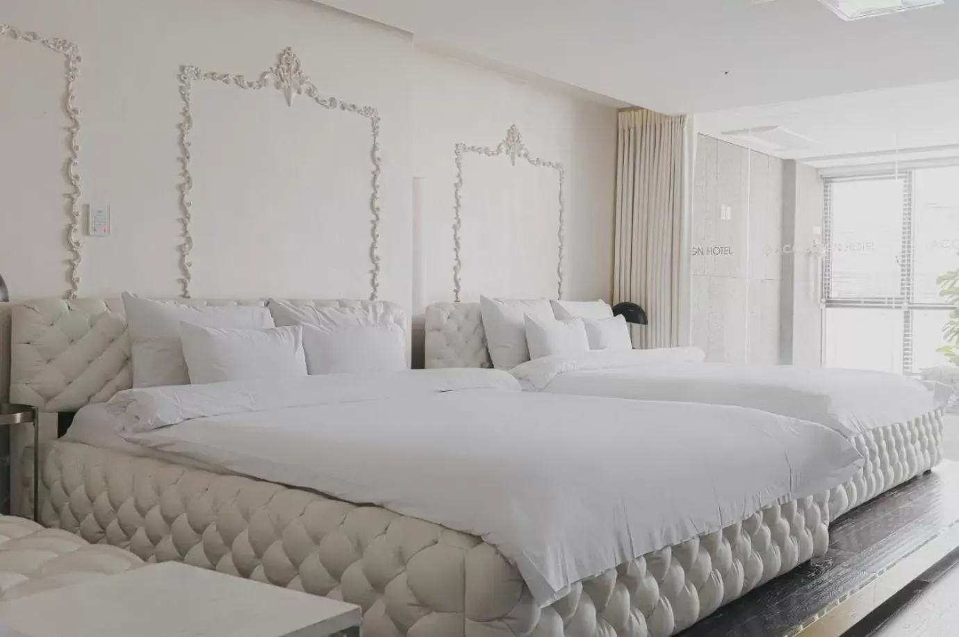 Bed in ACC Design Hotel