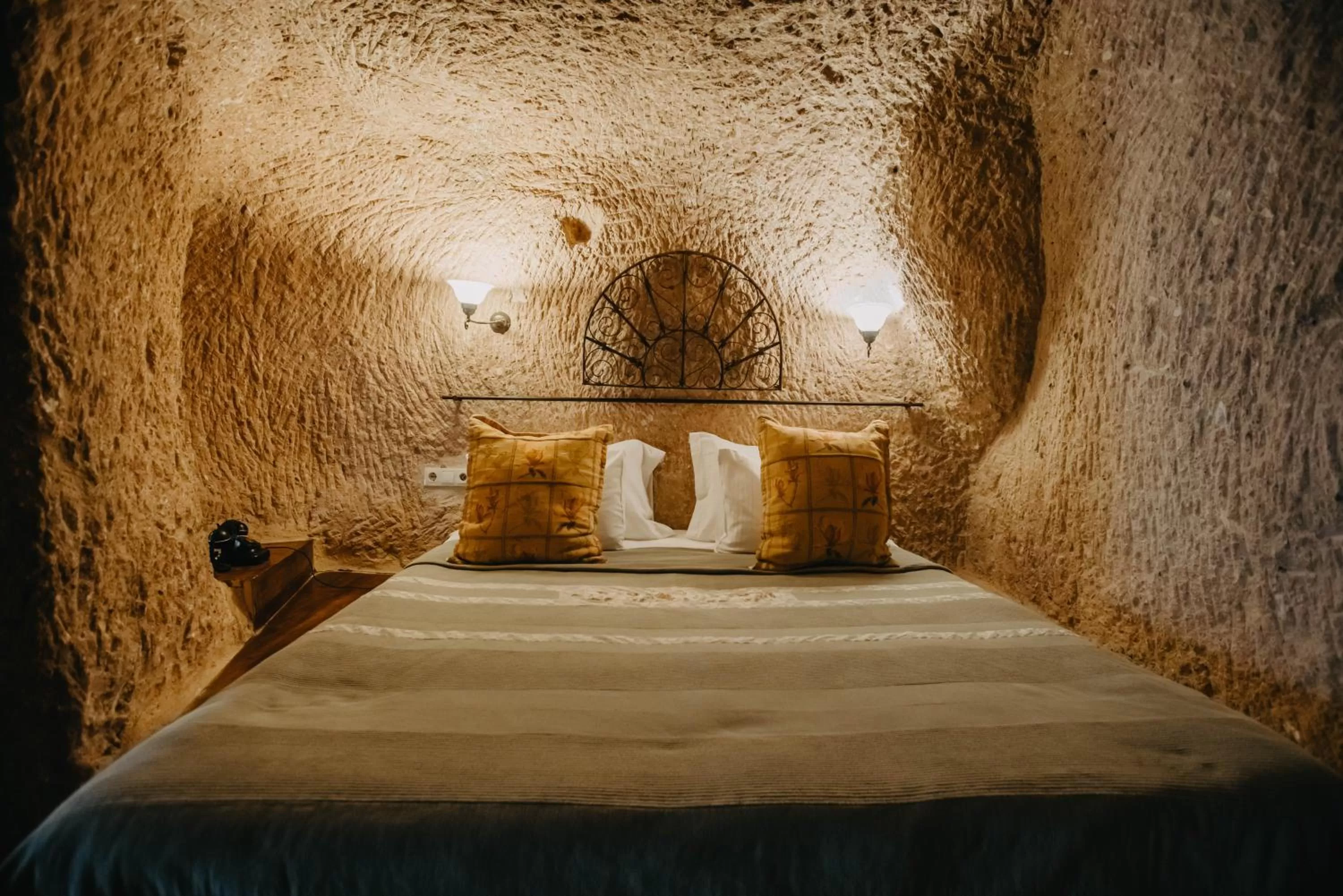 Bed in Melekler Evi Cave Hotel