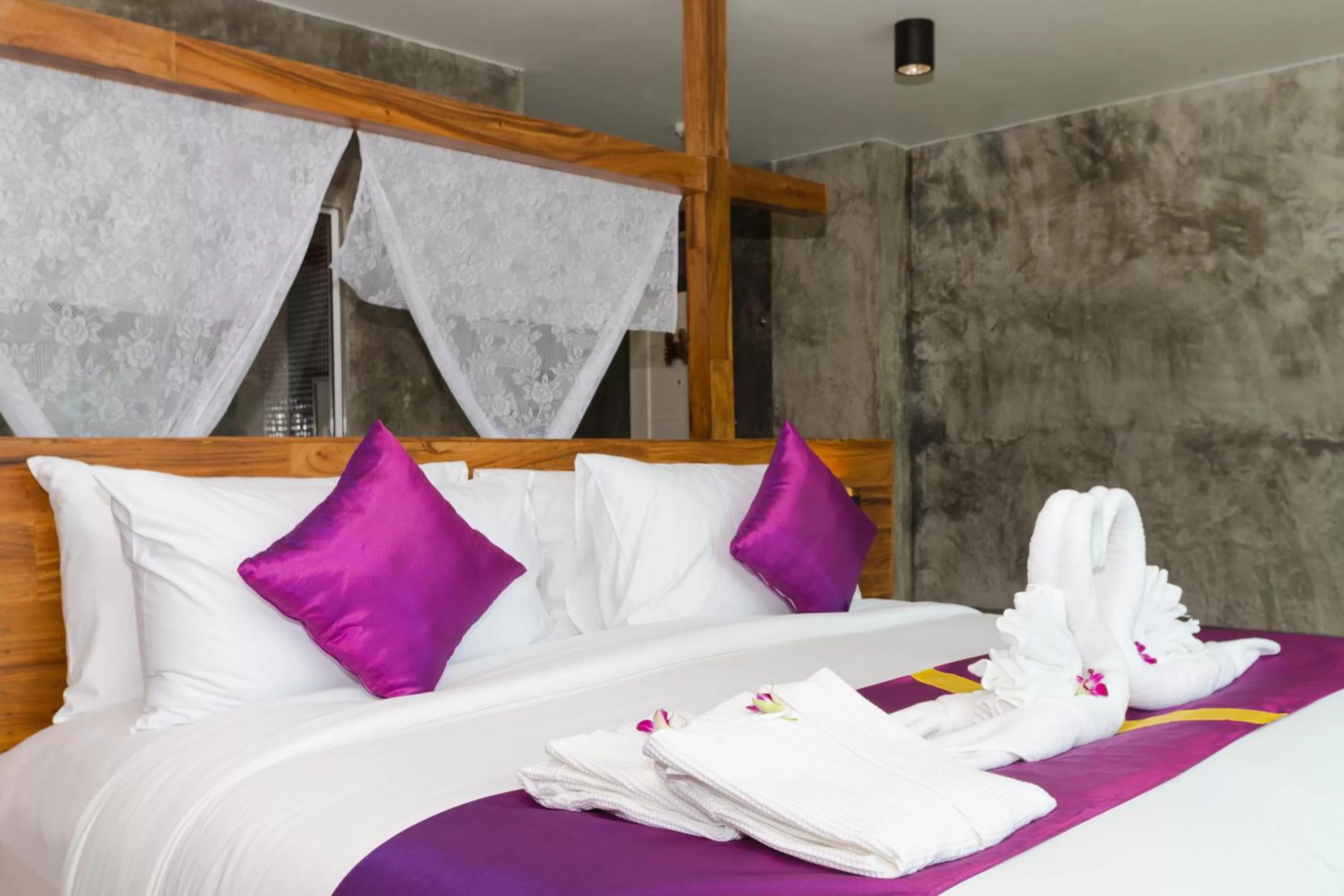 Bed in Maneetel Krabi Beachfront-SHA Plus