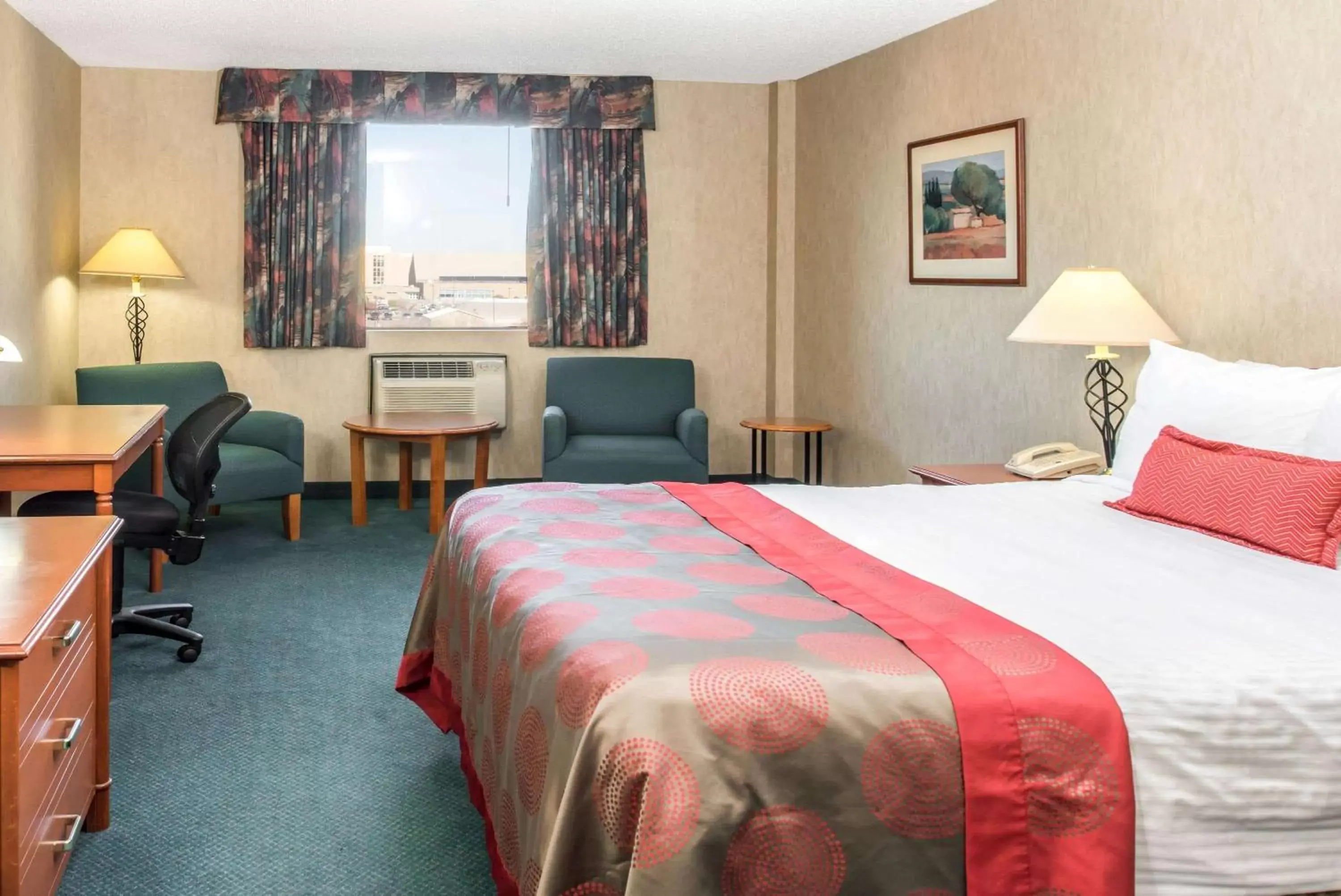 Photo of the whole room, Bed in Ramada by Wyndham Saskatoon