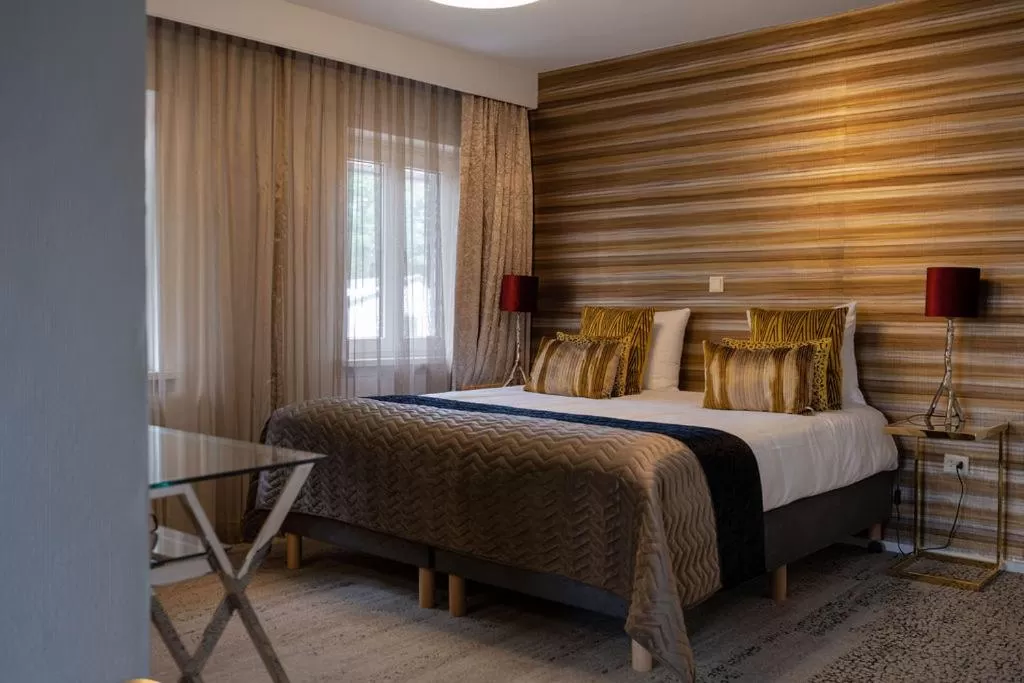 Bed in Boutique Hotel Slenaker Vallei - Buitengewoongenieten