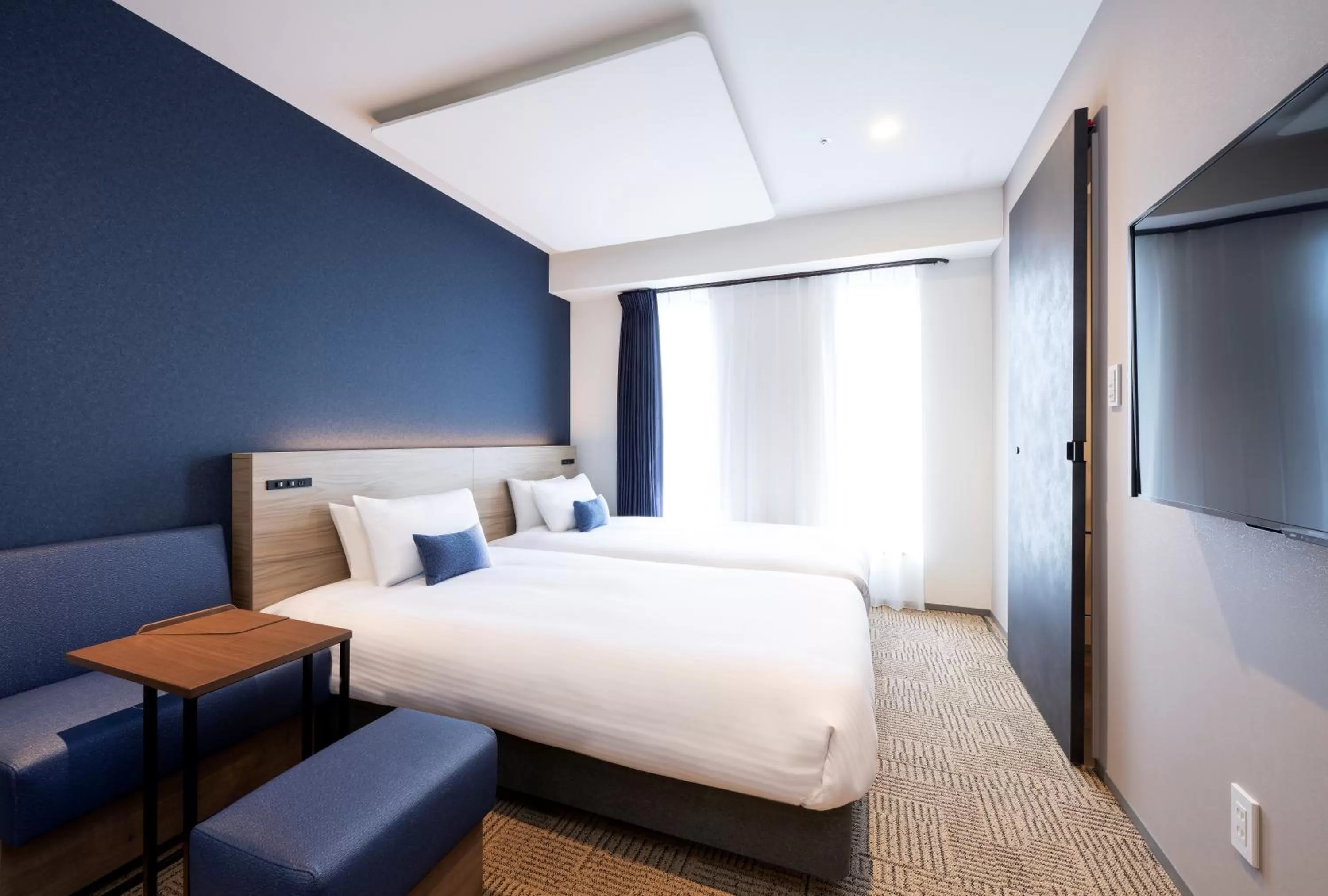 Photo of the whole room, Bed in HOTEL AMANEK Shinjuku Kabukicho