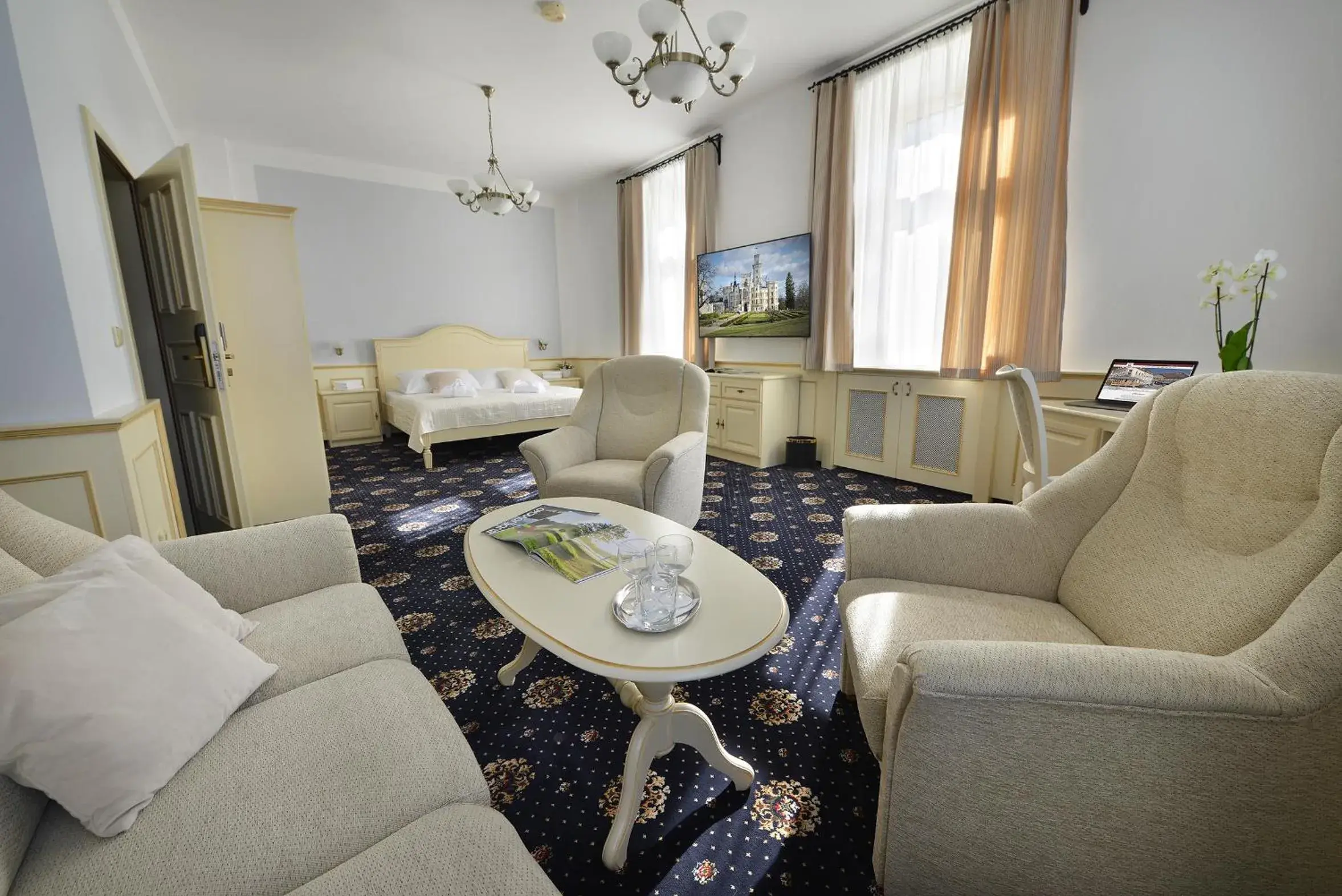 Bed, Seating Area in Hotel Podhrad