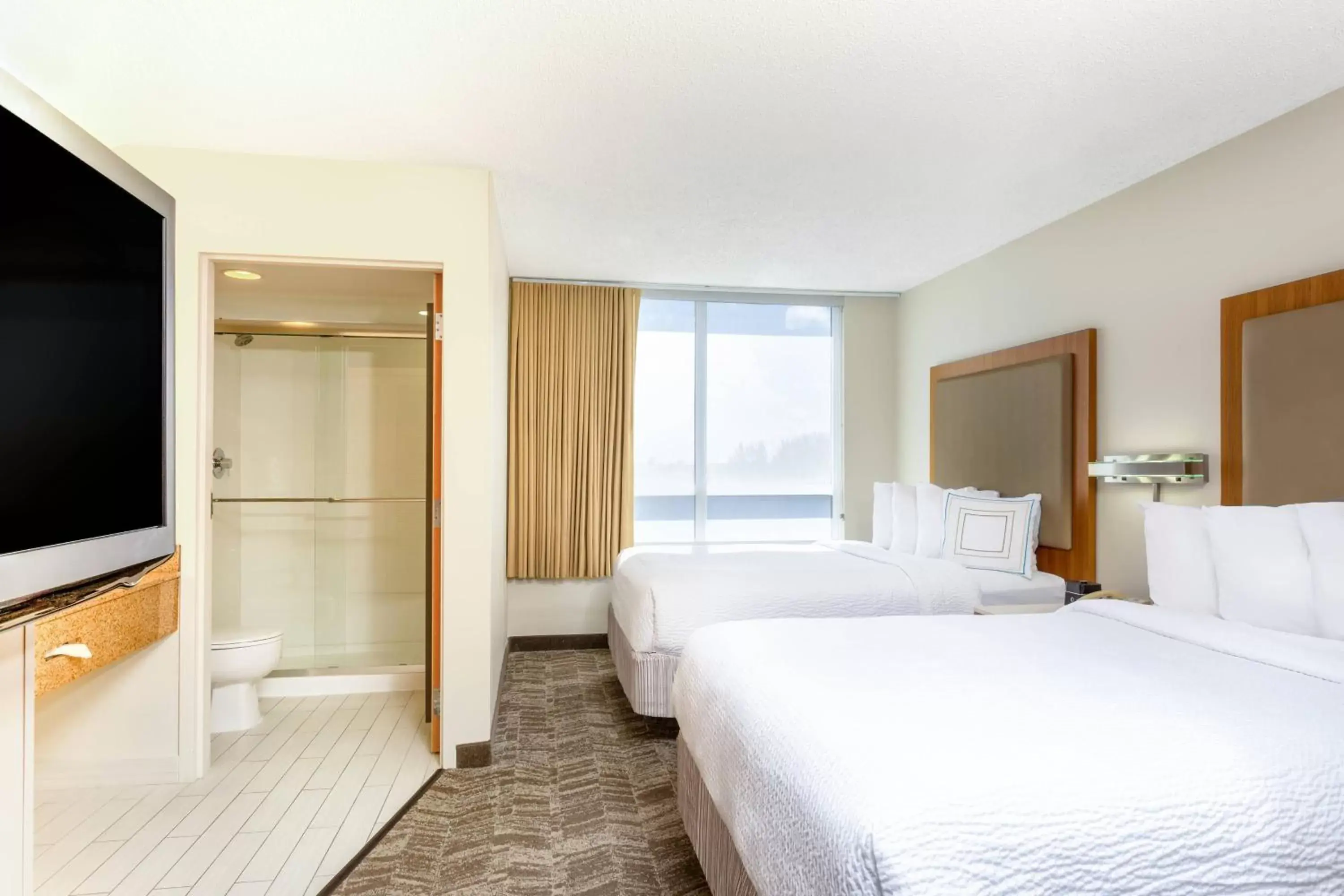 Photo of the whole room, Bed in SpringHill Suites by Marriott Miami Airport South Blue Lagoon Area