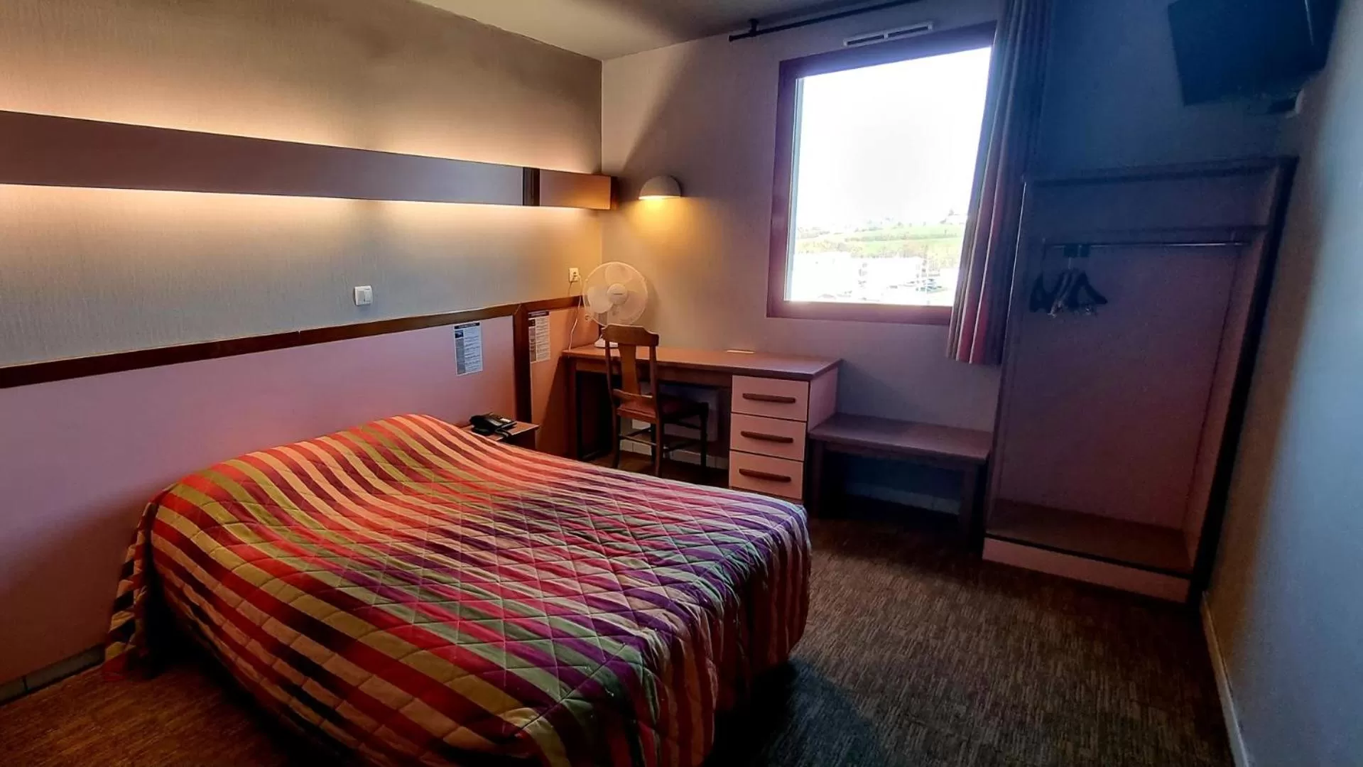 Bed in Hôtel Siatel Besançon Chateaufarine