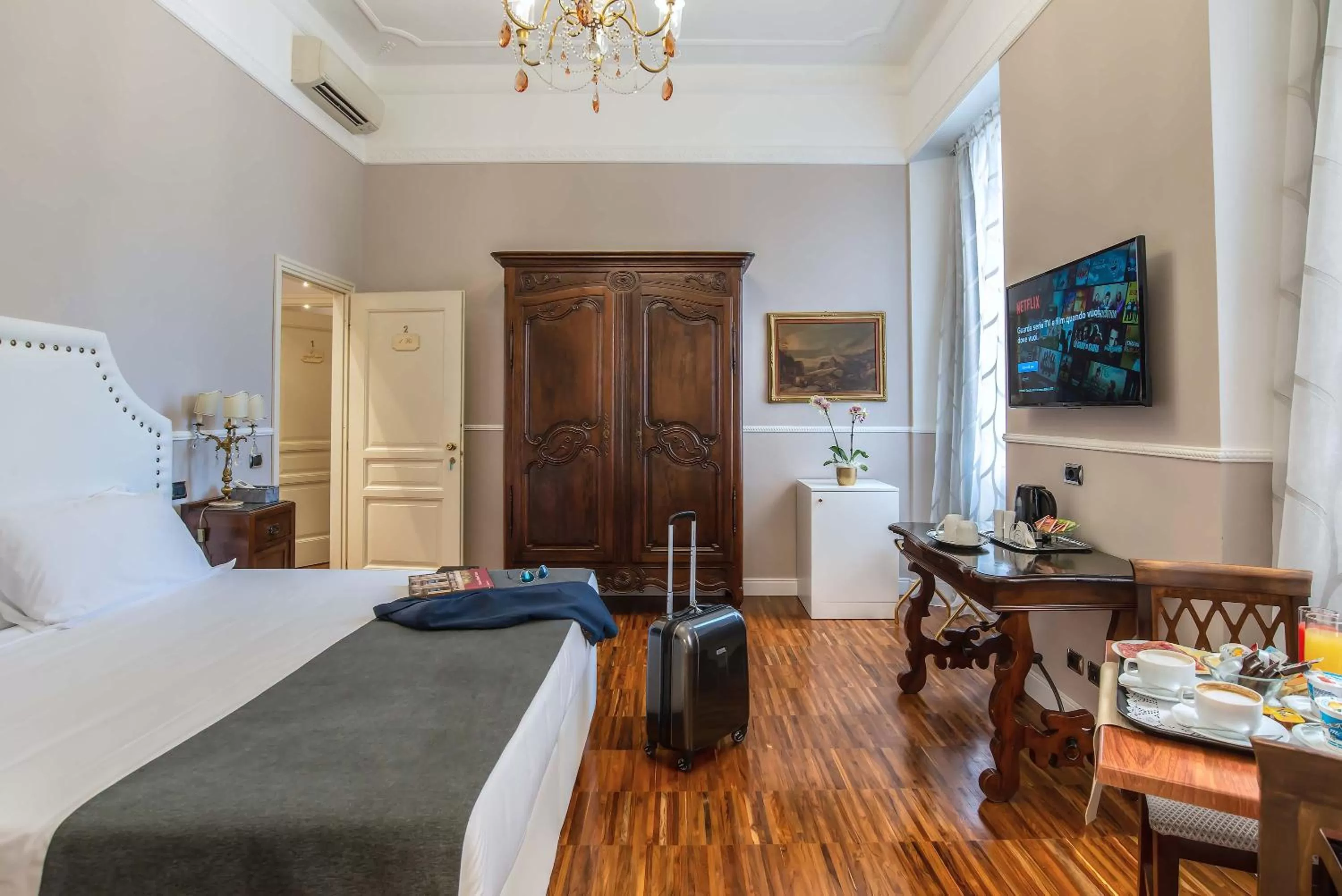 Bed in I TRE MOSCHETTIERI - D'ARTAGNAN Luxury Guest House