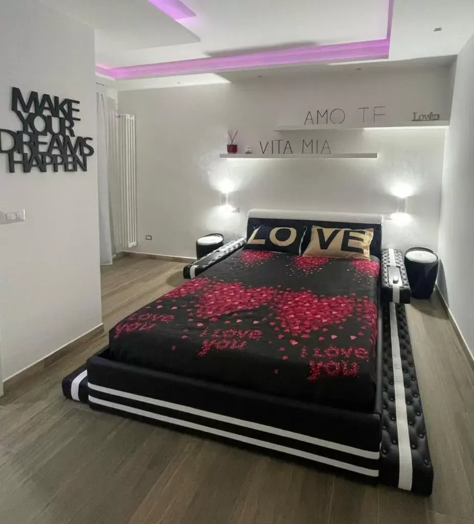 Bed in Due Cuori Suite con vasca idromassaggi