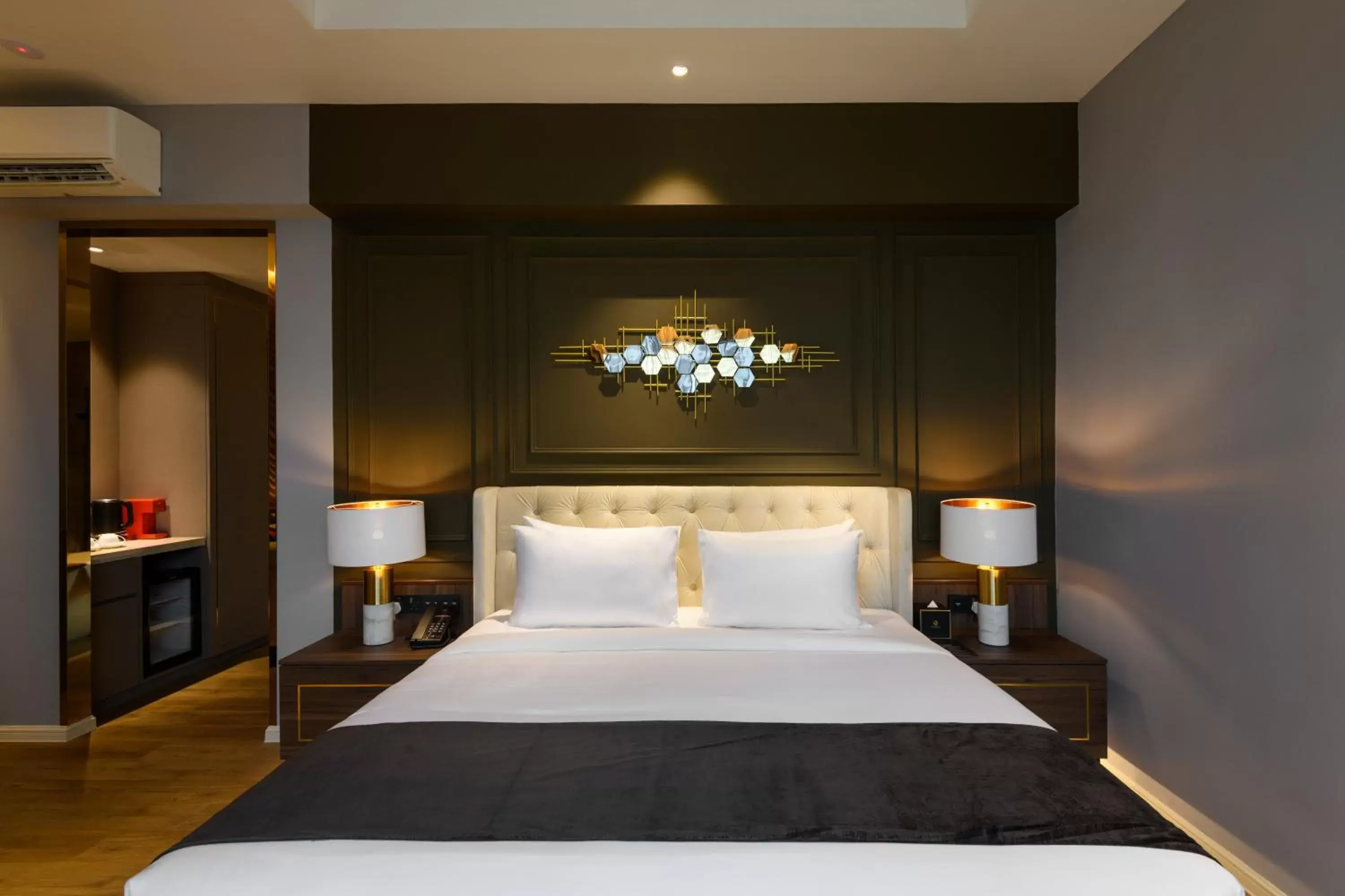 Bed in The Granite Luxury Hotel Penang