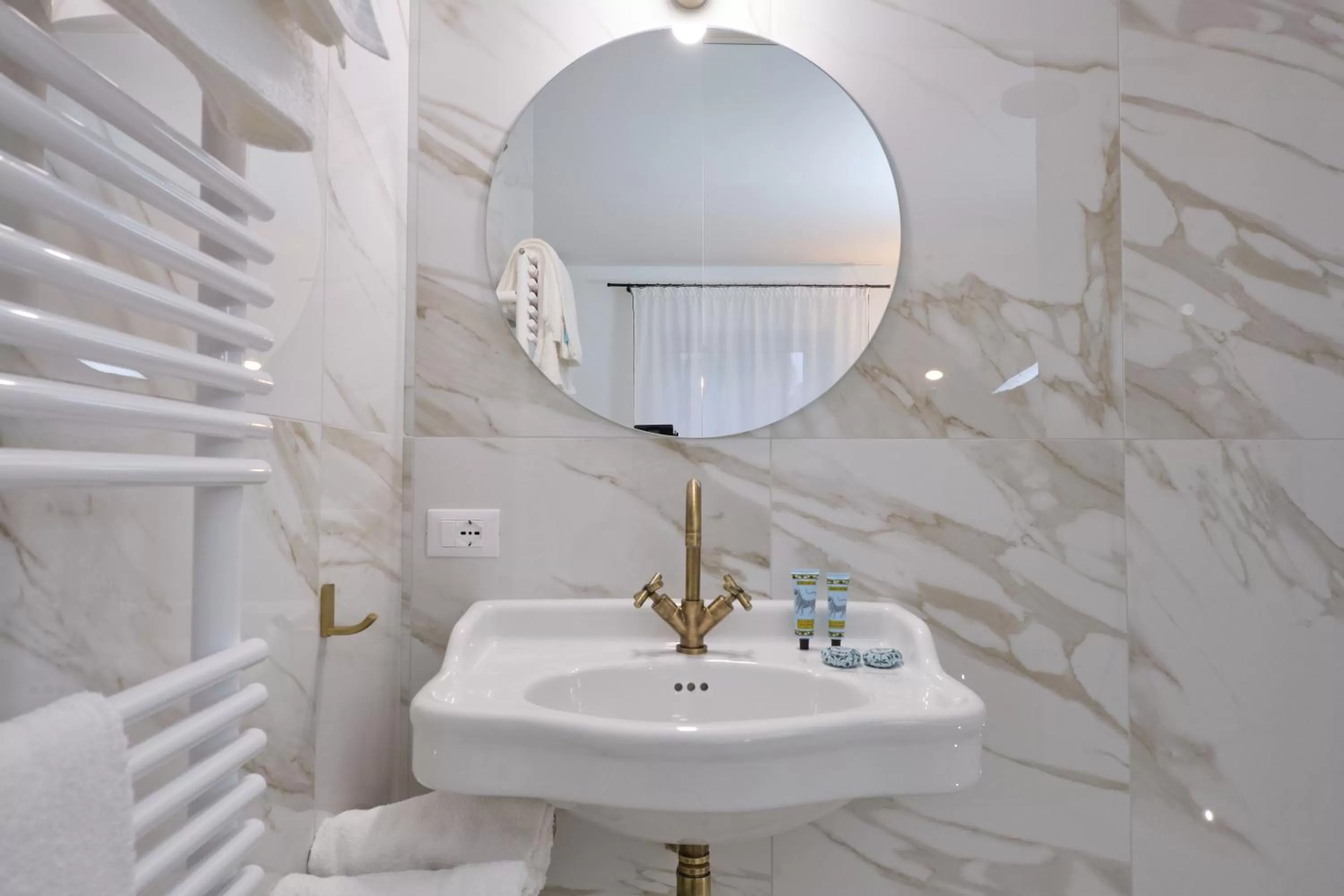 Bathroom in Archè Design Rooms and Suites