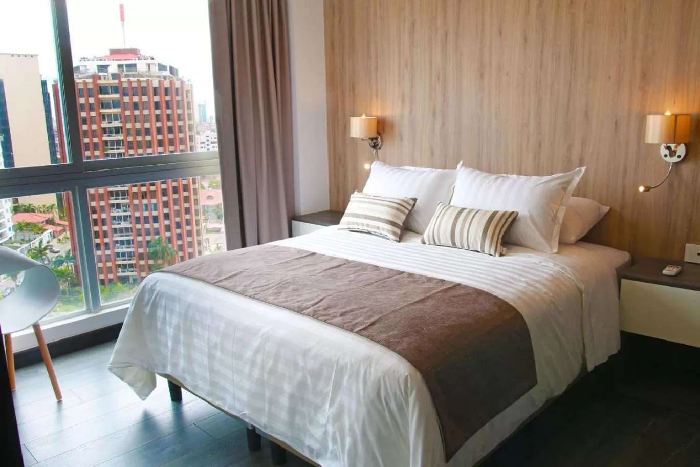 Bed in Urban Suites Apart Hotel