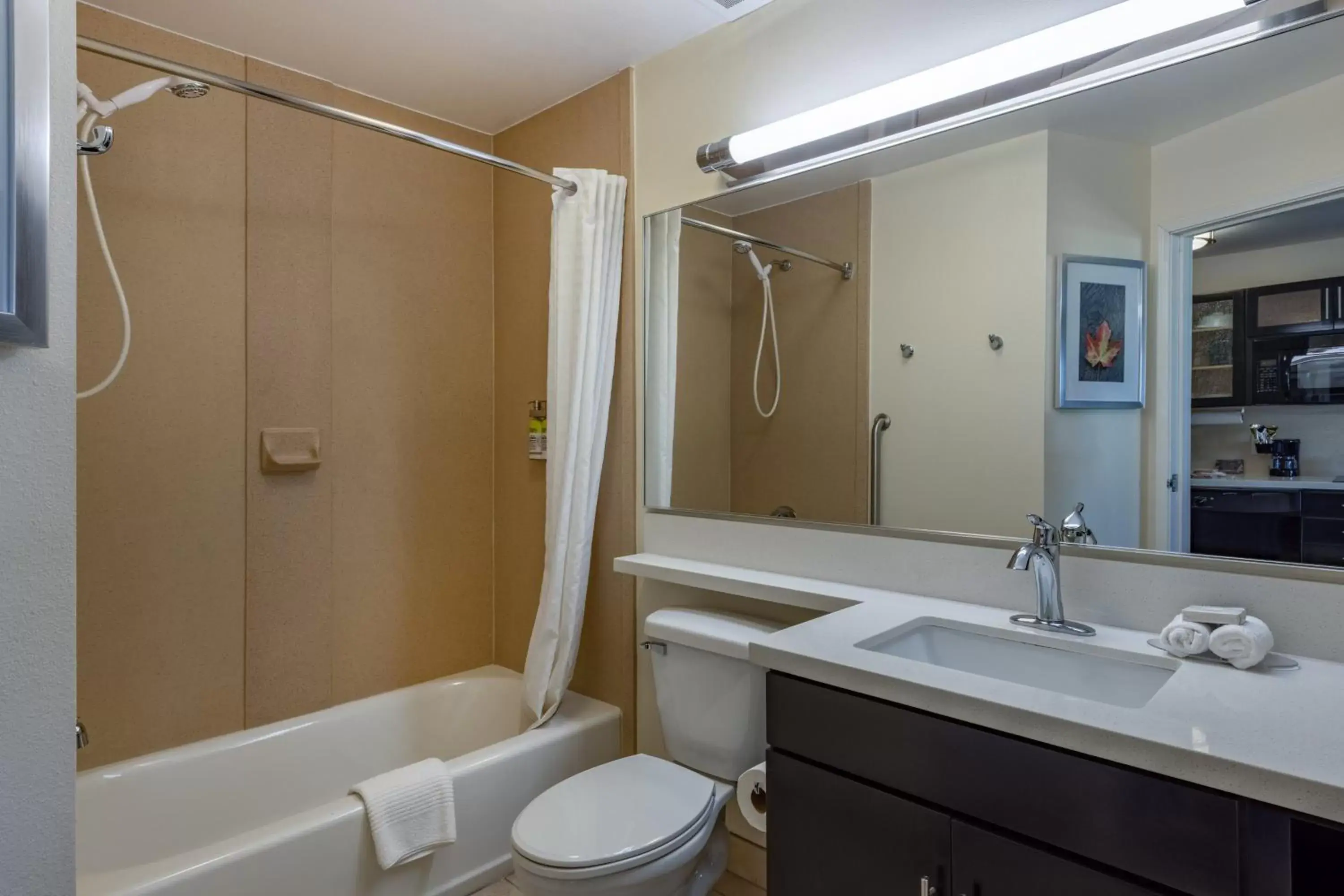 Toilet, Bathroom in Candlewood Suites Springfield South, an IHG Hotel