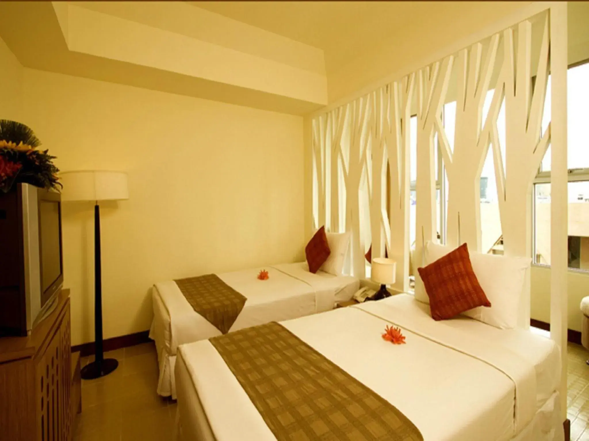 Bed in Maninarakorn Hotel