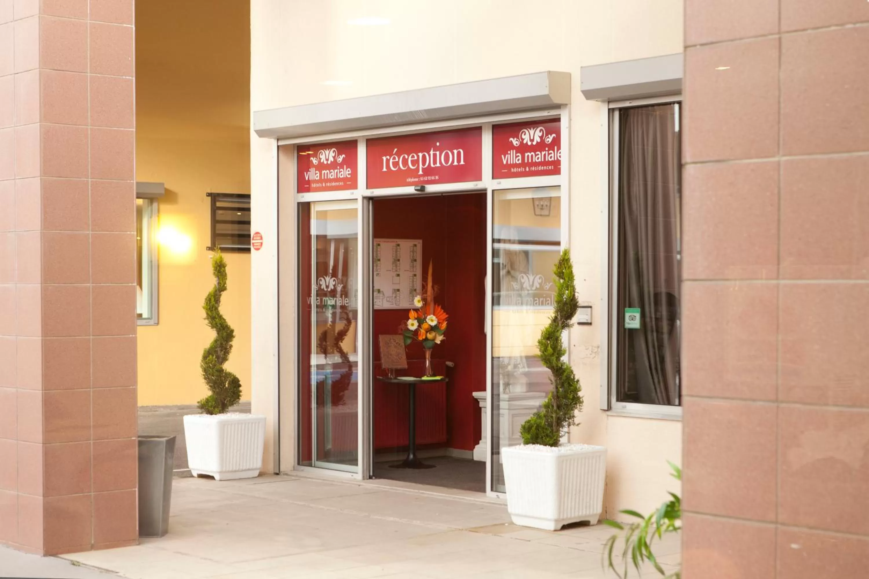 Facade/entrance in Villa Mariale by Popinns