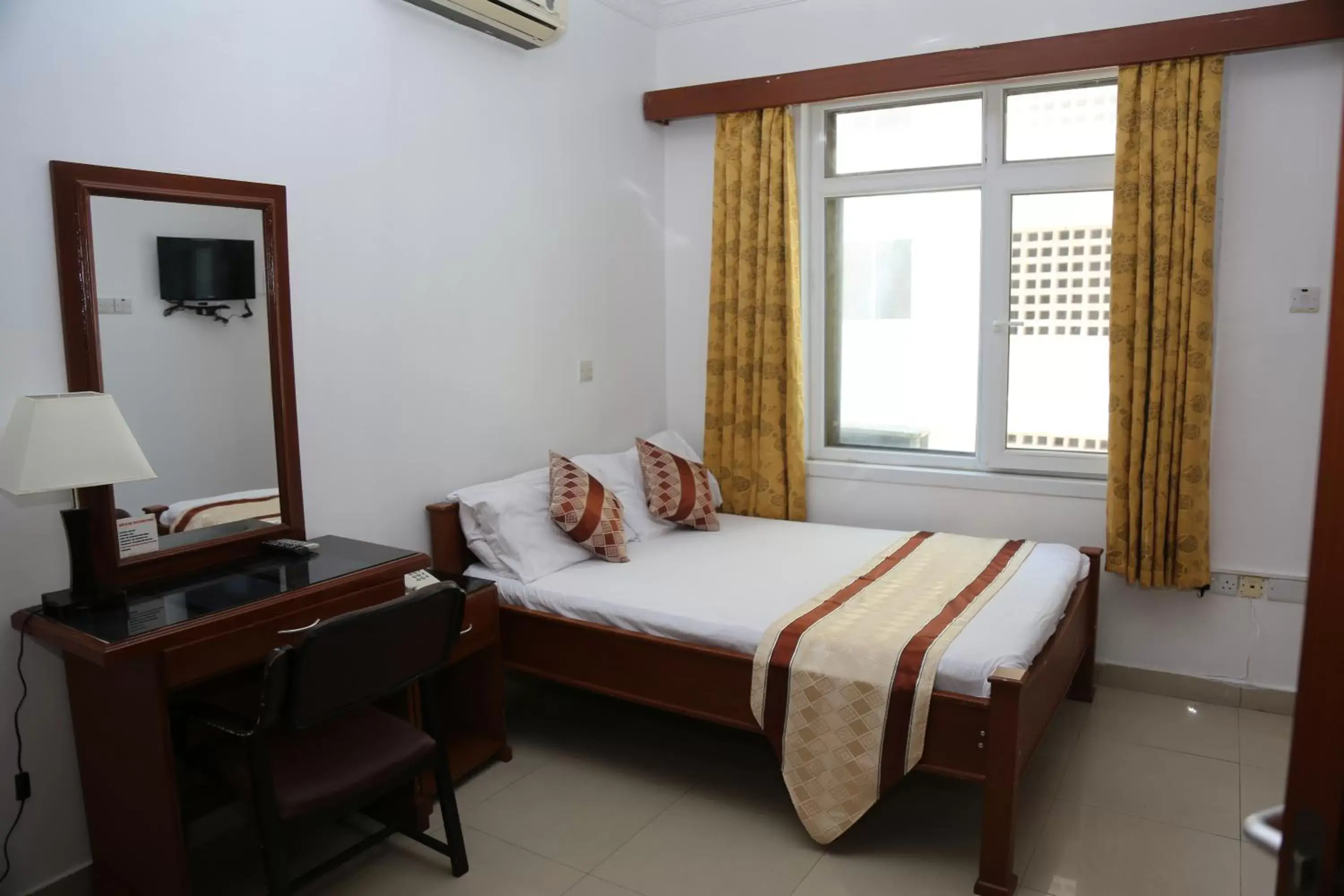 Bed in Rainbow Hotel Bed in Rainbow Hotel