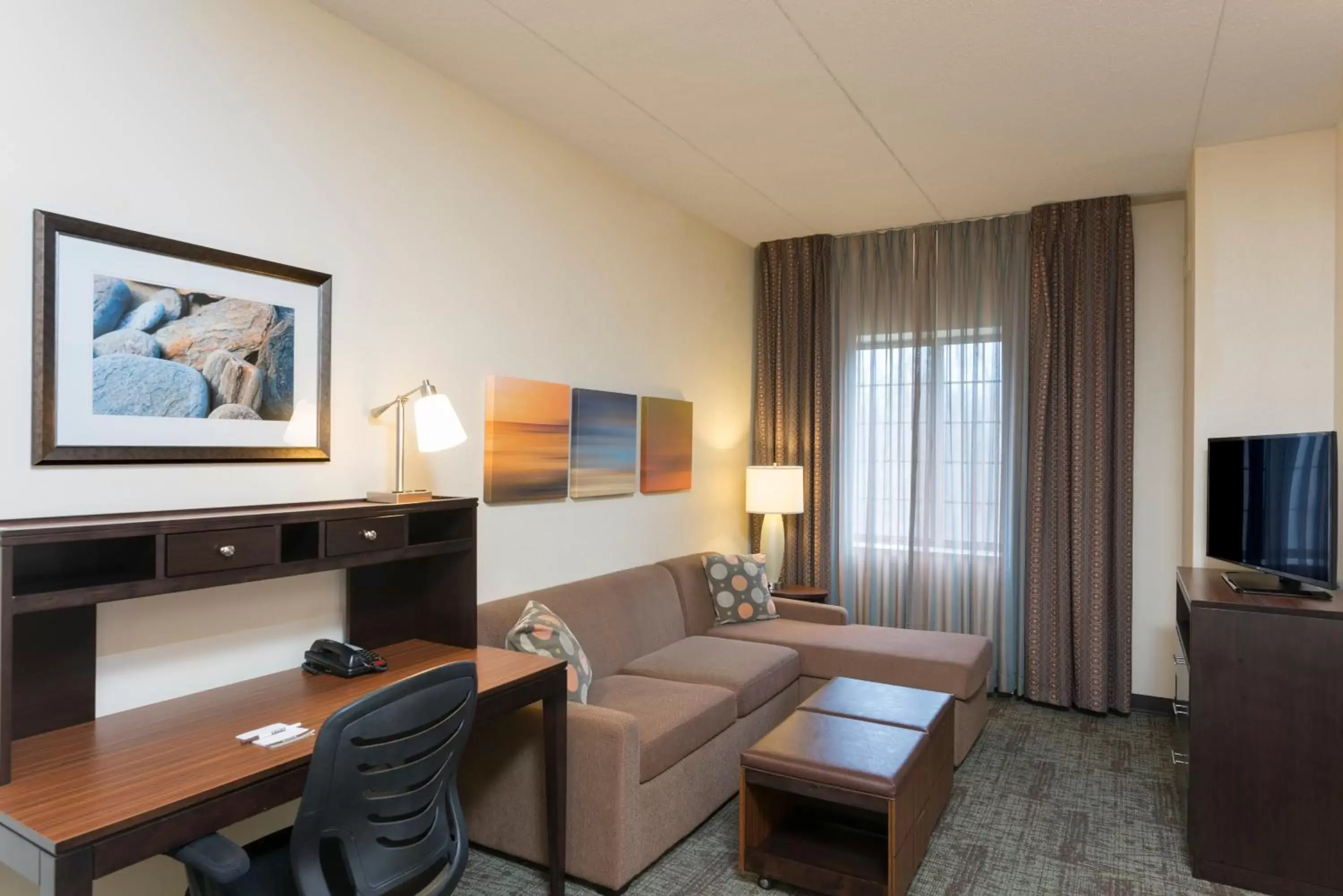Photo of the whole room, TV/Entertainment Center in Staybridge Suites Chicago-Oakbrook Terrace, an IHG Hotel