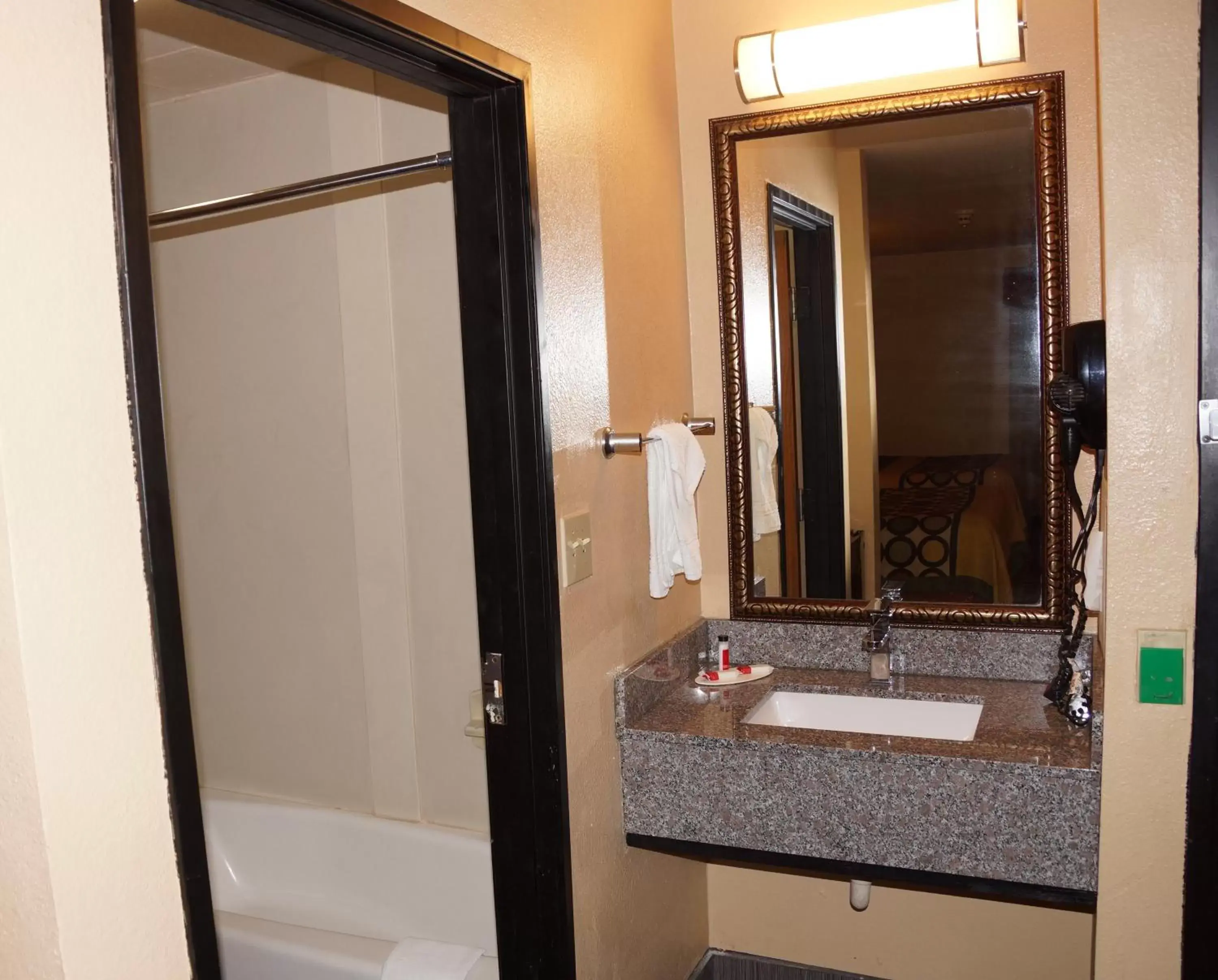 Bathroom in Super 8 by Wyndham Farmers Branch/North Dallas