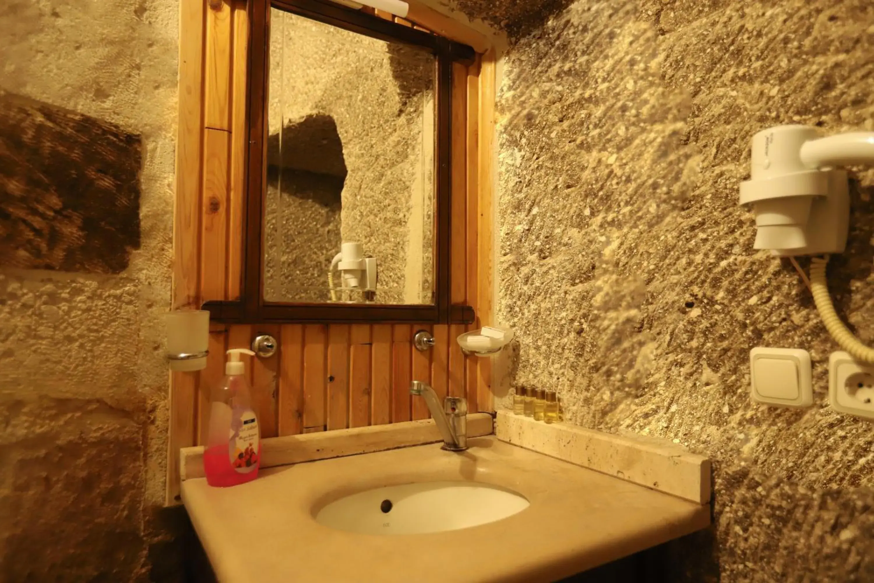 Bathroom in Antique Terrace Cave Suites