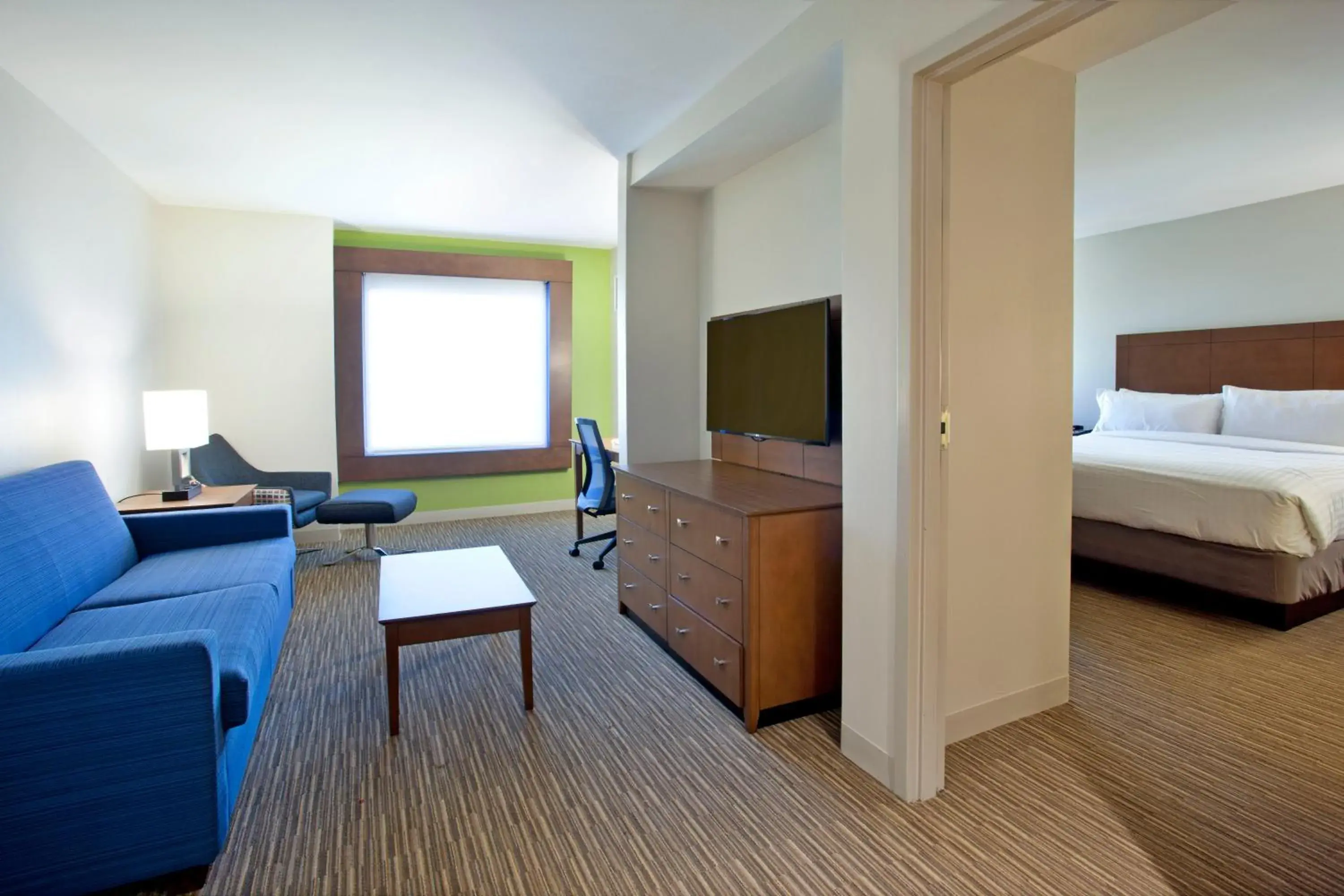 Photo of the whole room, TV/Entertainment Center in Holiday Inn Express Hotel & Suites Austin Downtown - University, an IHG Hotel