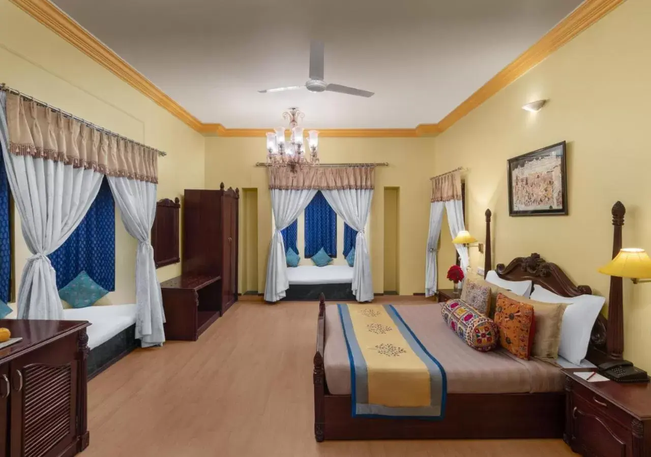 Bed in juSTa Rajputana Resort & Spa