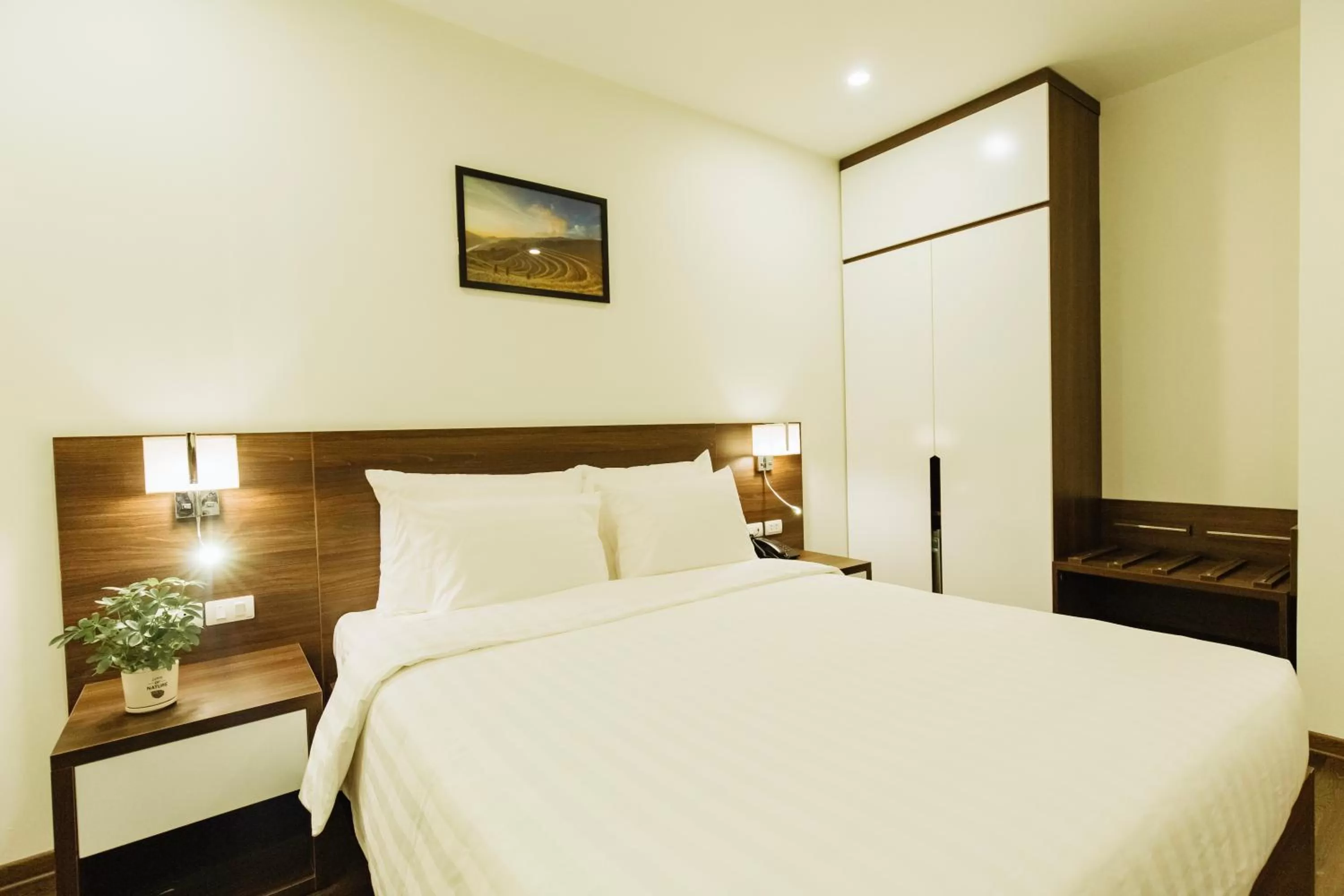 Bed in Paragon Noi bai Hotel & Pool