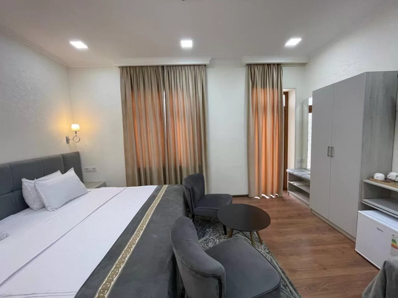 Bed in Registon Saroy Hotel