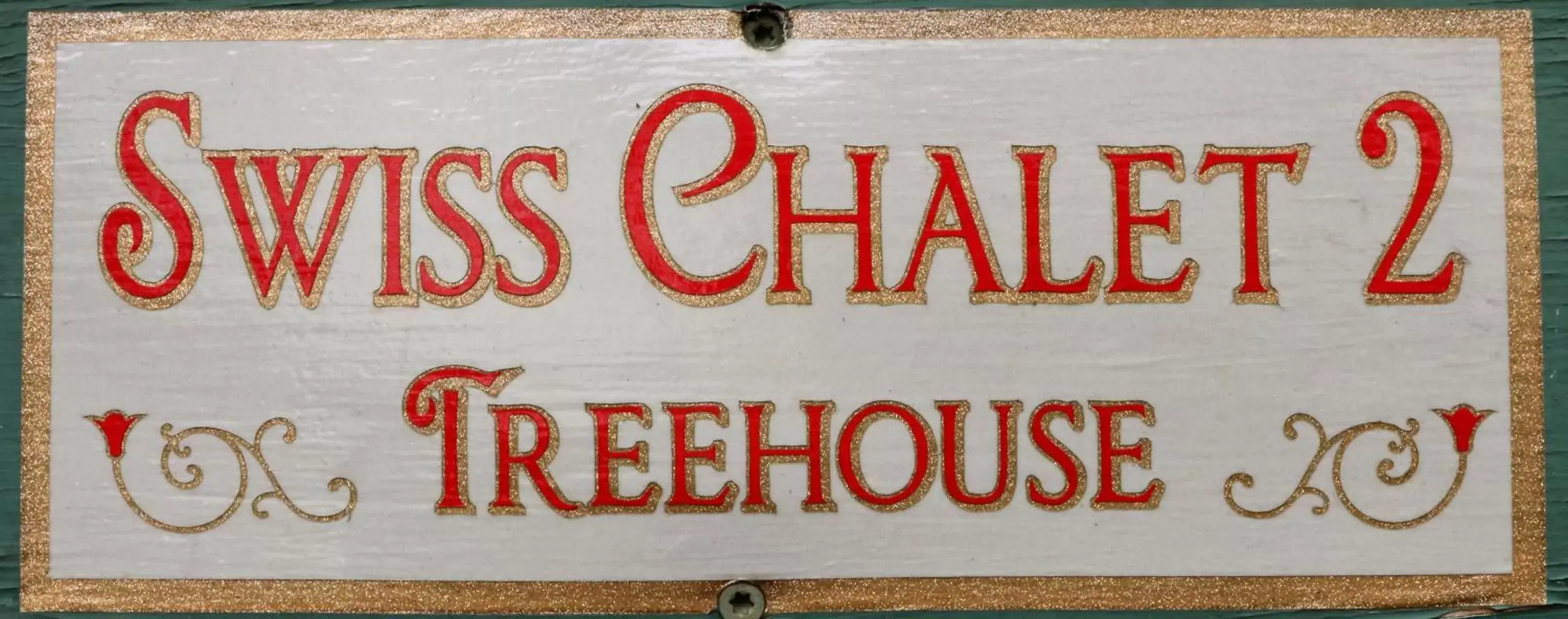 Property logo or sign in The Grand Treehouse Resort