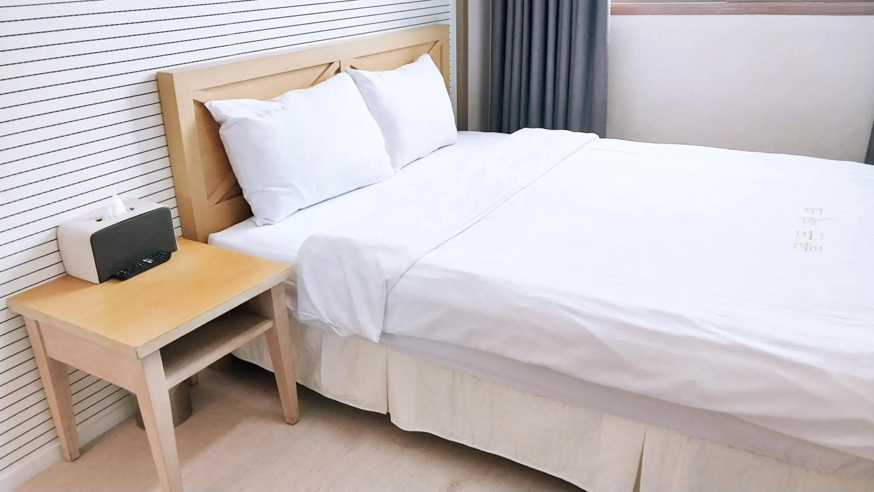 Bed in Golden Park Hotel Jeju