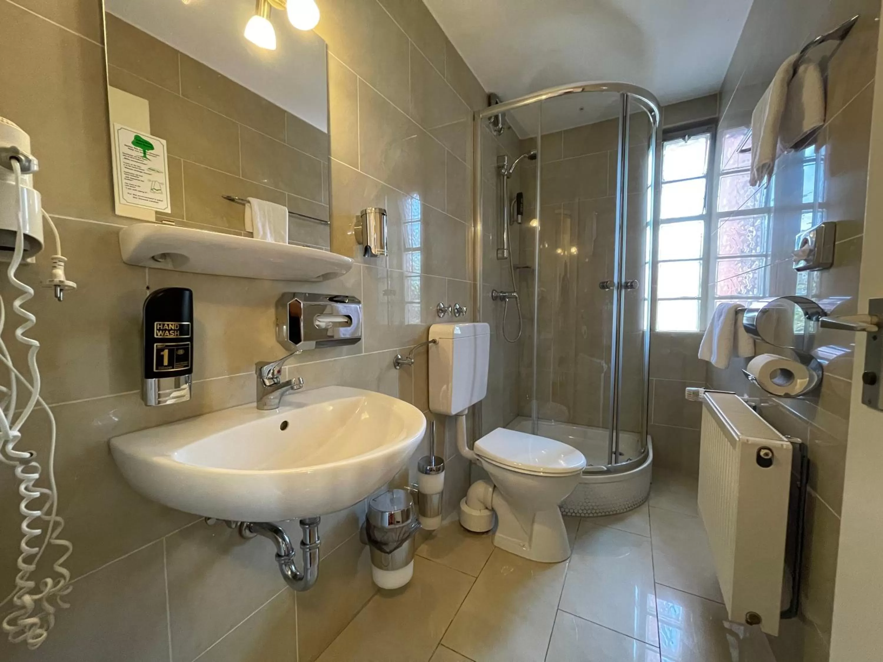 Bathroom in Hafner Hotel- Apartment