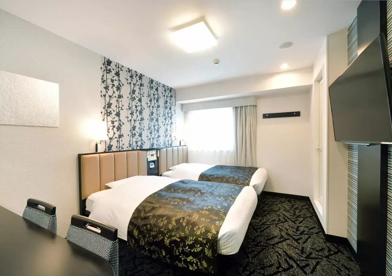 Photo of the whole room, Bed in APA Hotel Nagoya Ekimae Minami