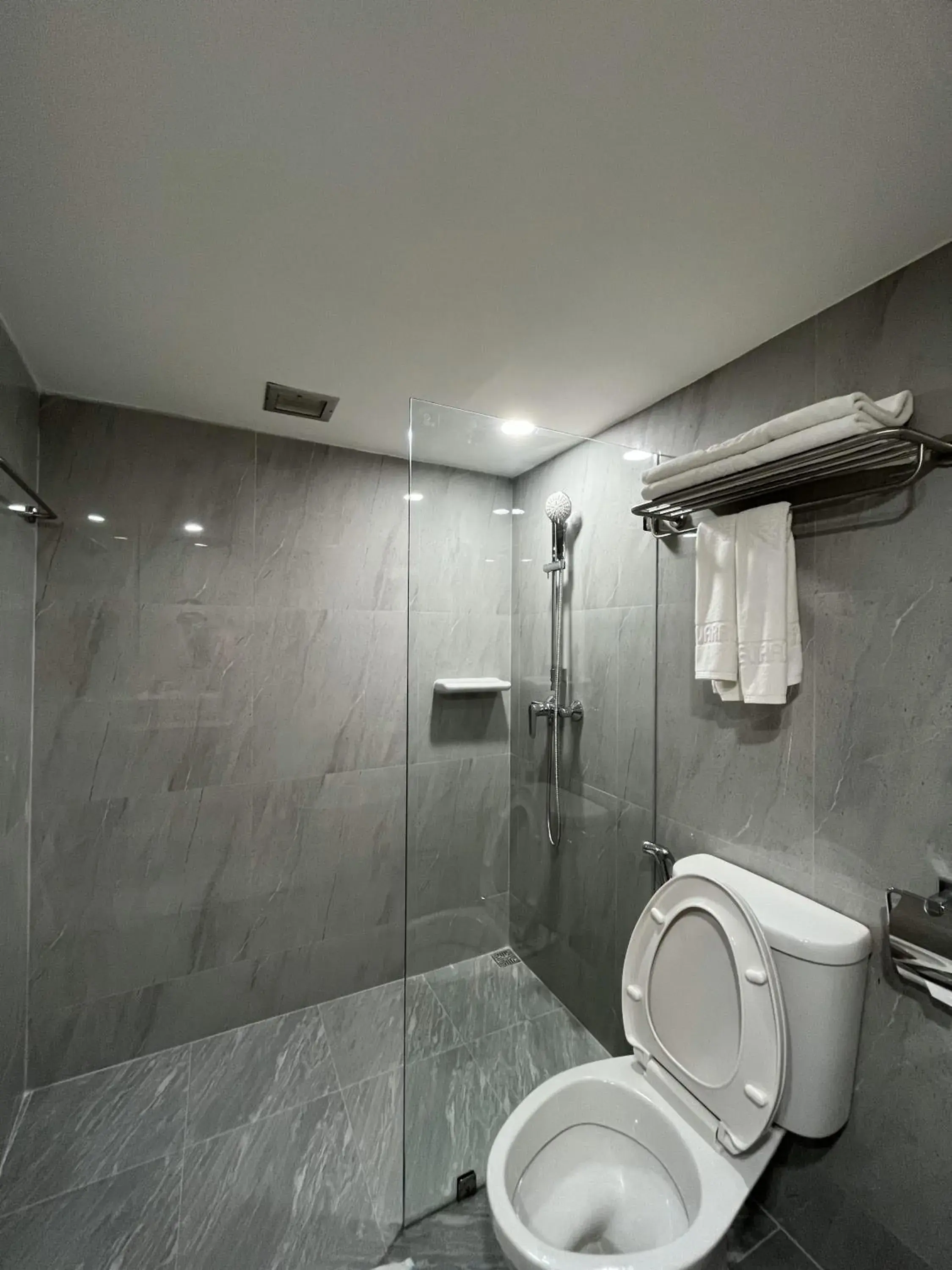 Bathroom in Dhevaraj Hotel