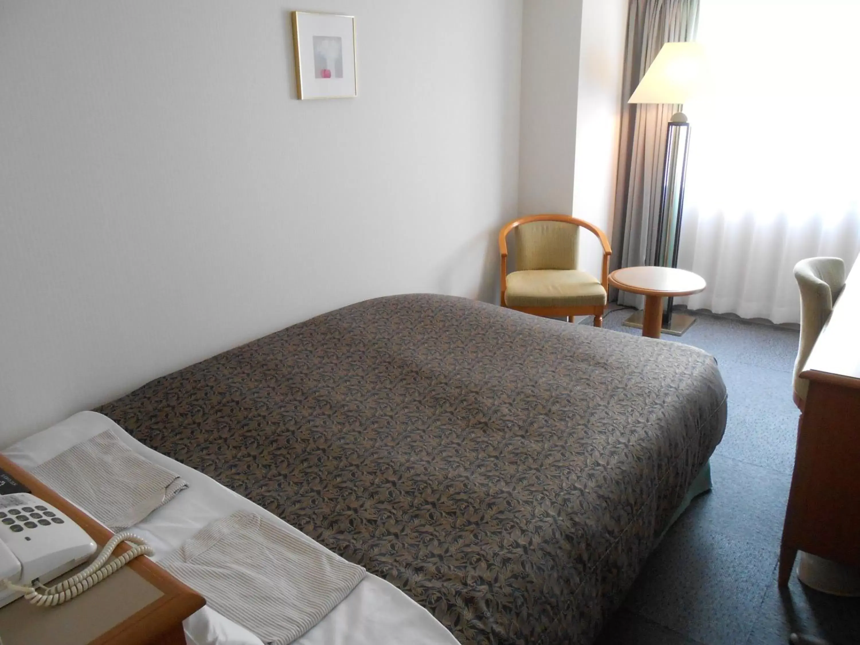 Photo of the whole room, Bed in Hotel Sunroute Niigata