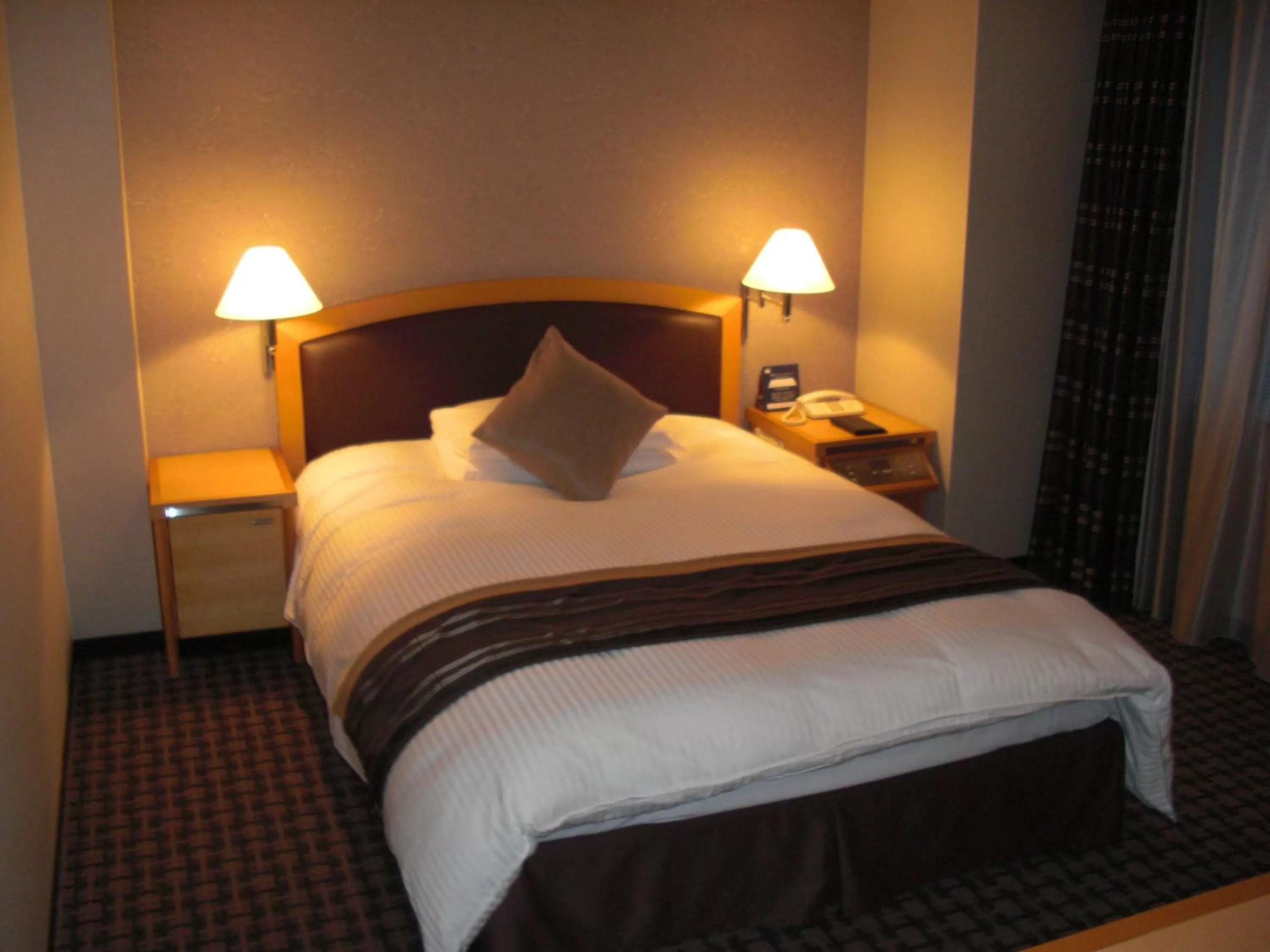 Photo of the whole room, Bed in Royal Pines Hotel Urawa