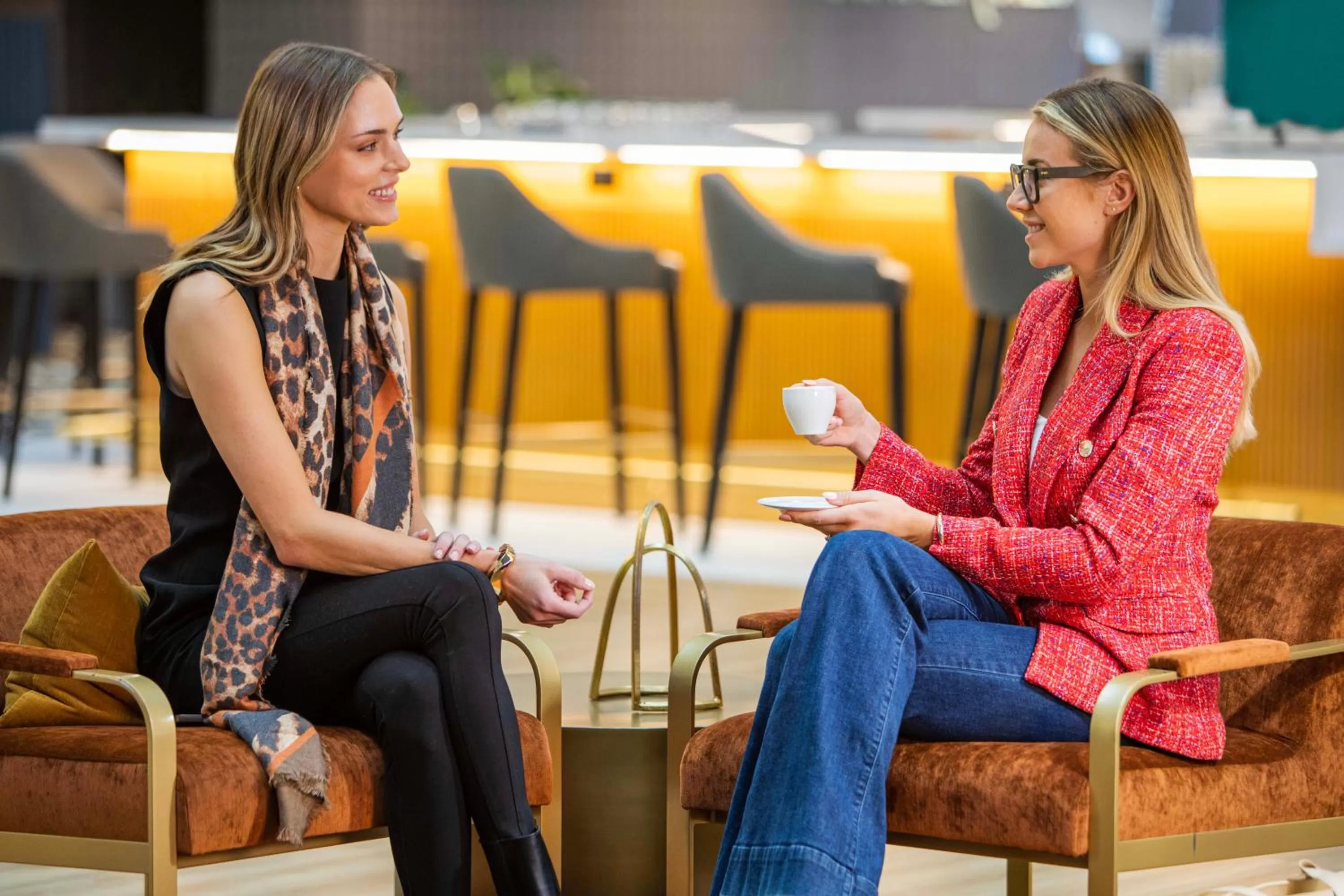 Seating area in voco Chicago Downtown - Riverwalk by IHG