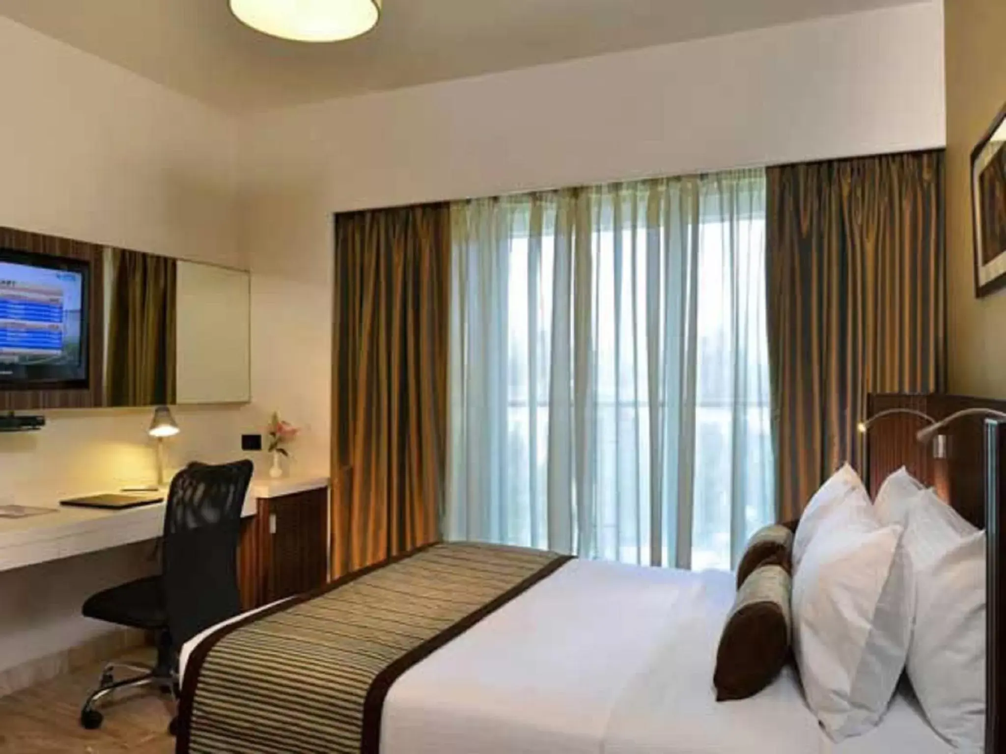 Bedroom, Bed in Residency Sarovar Portico