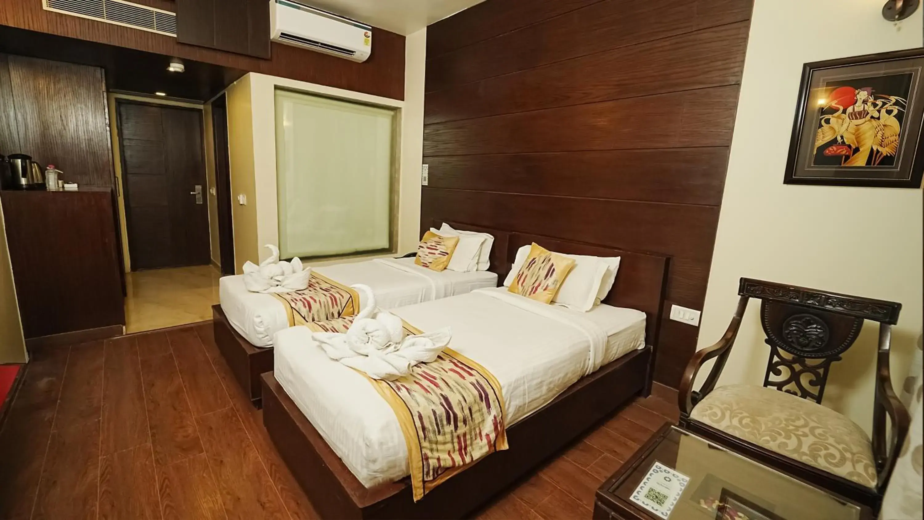 Bed in Hotel Atulyaa Taj