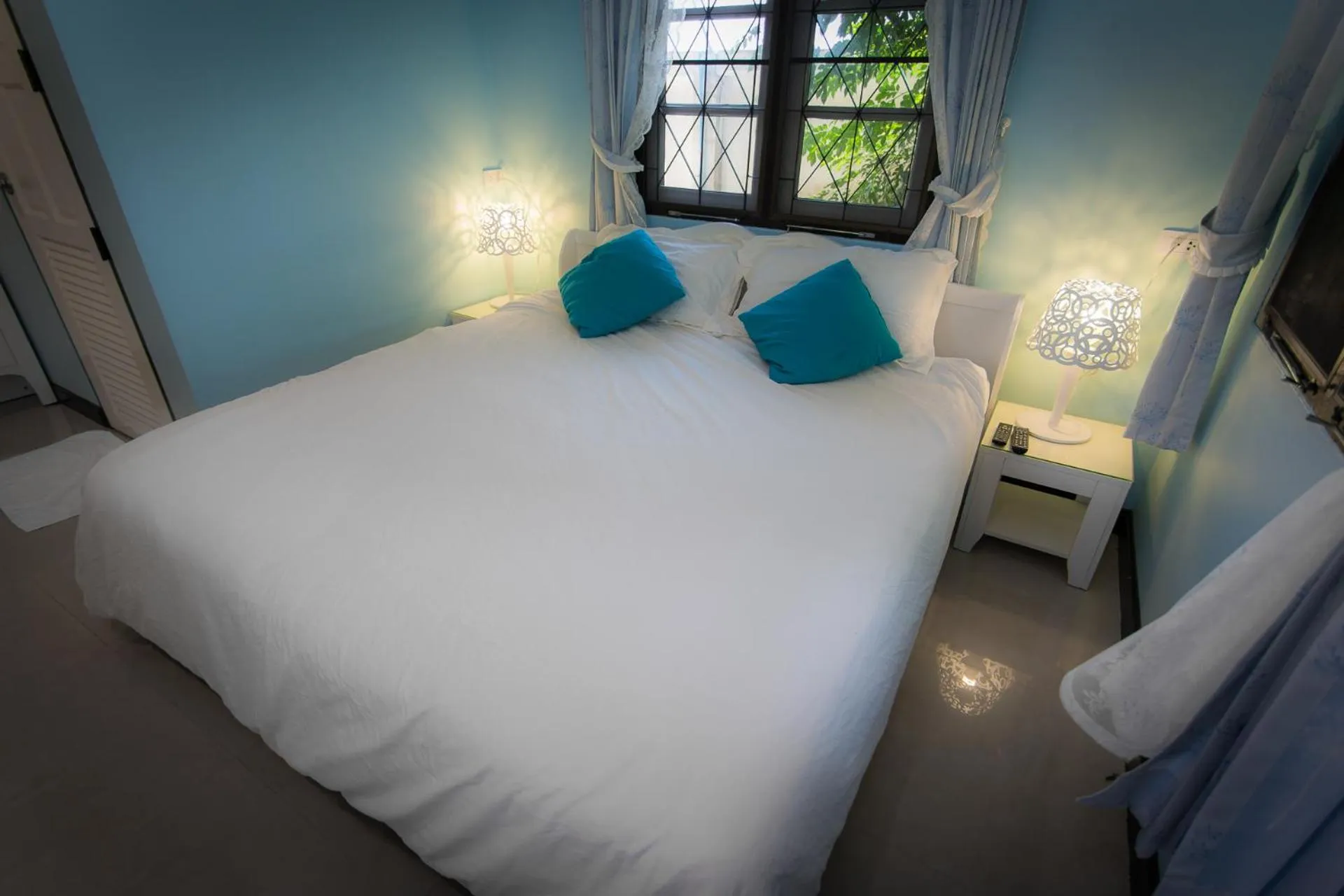 Bed in Thararin Villa