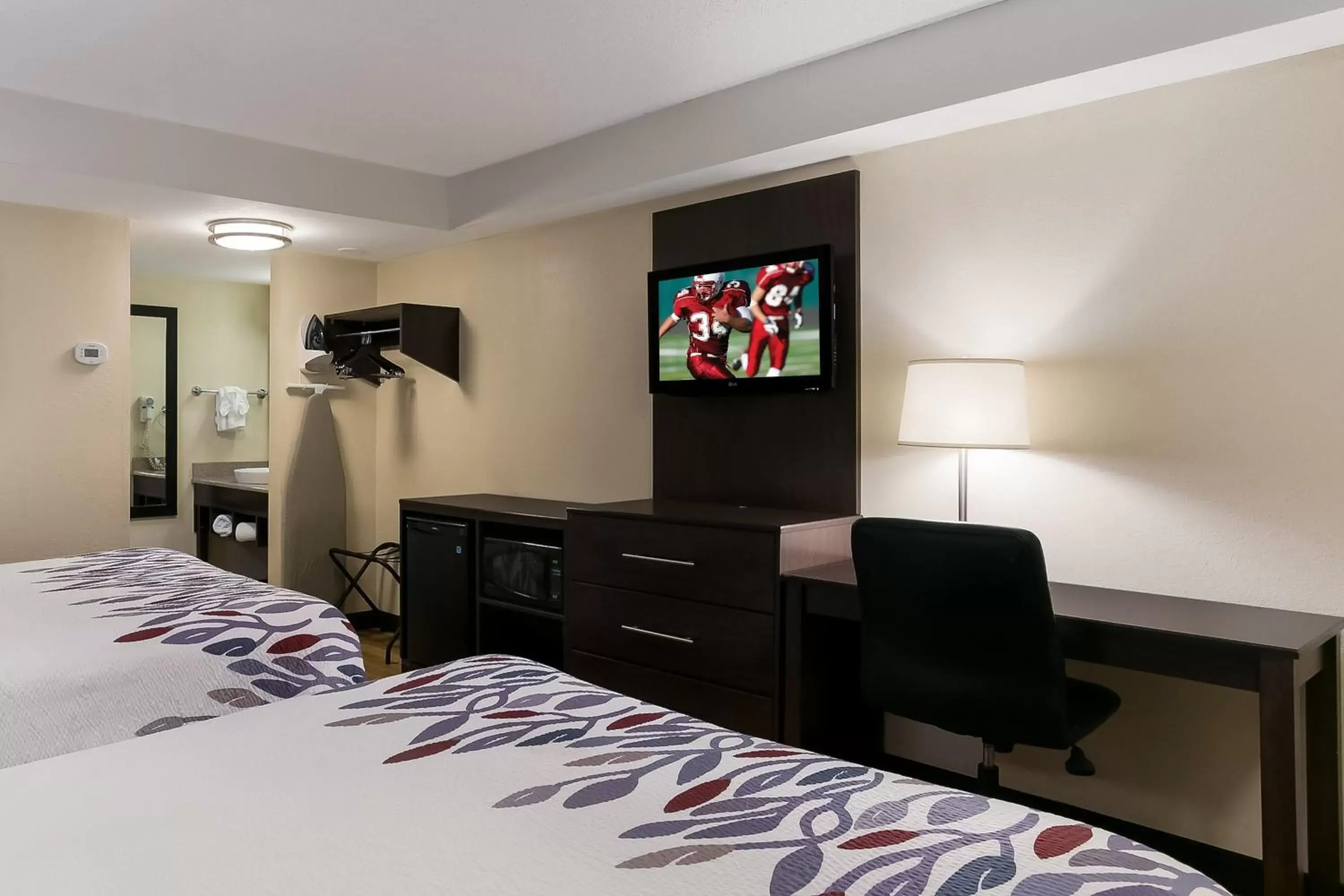 Photo of the whole room, TV/Entertainment Center in Red Roof Inn Hershey