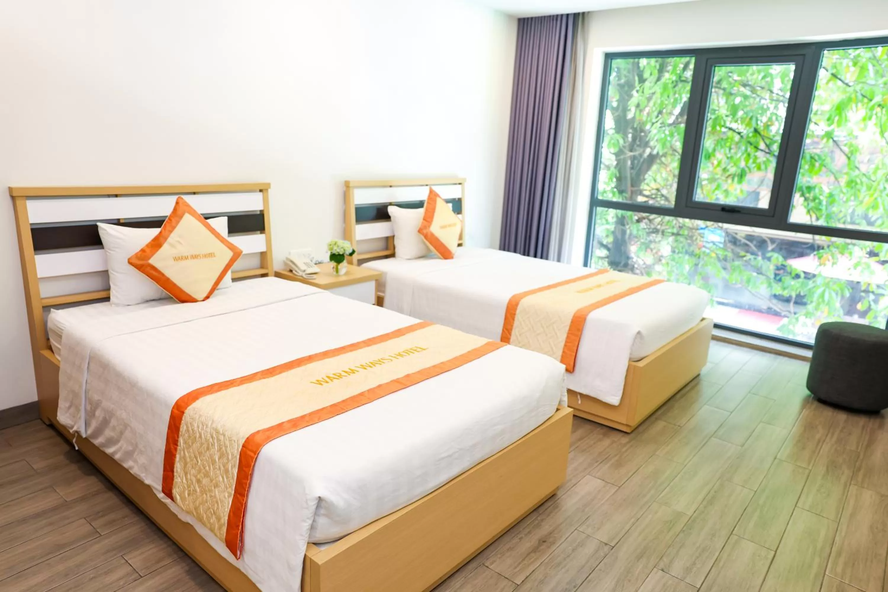 Bed in Warm Ways Hotel & Serviced Apartments