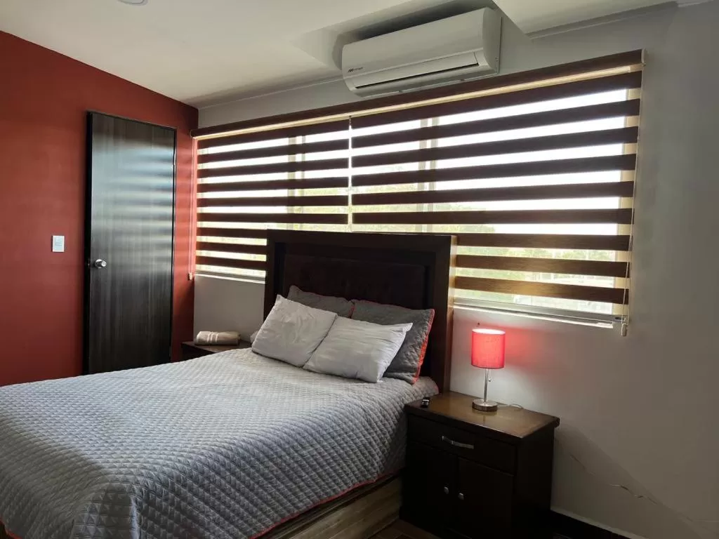 Bed in Departamentos Bonsai