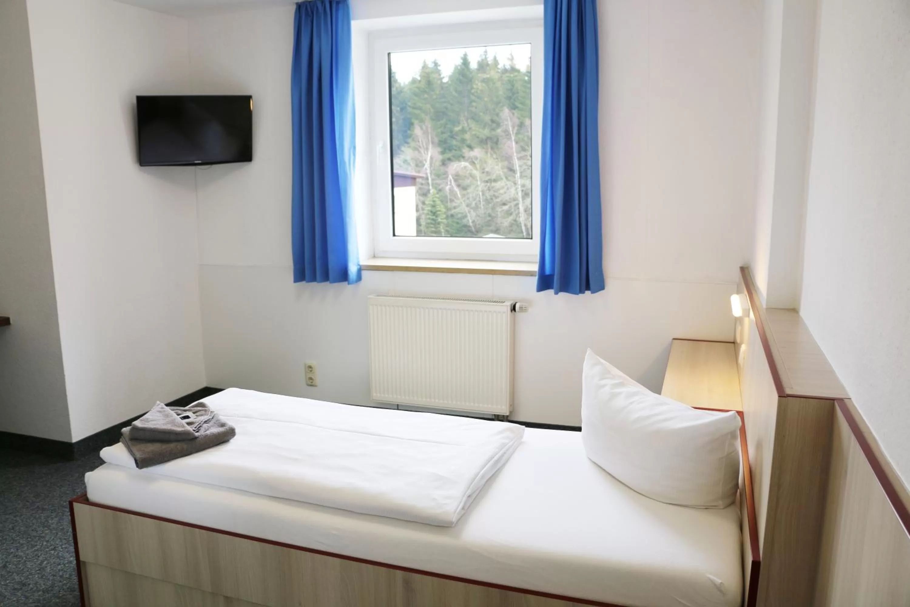 Photo of the whole room, Bed in Sportpark Rabenberg